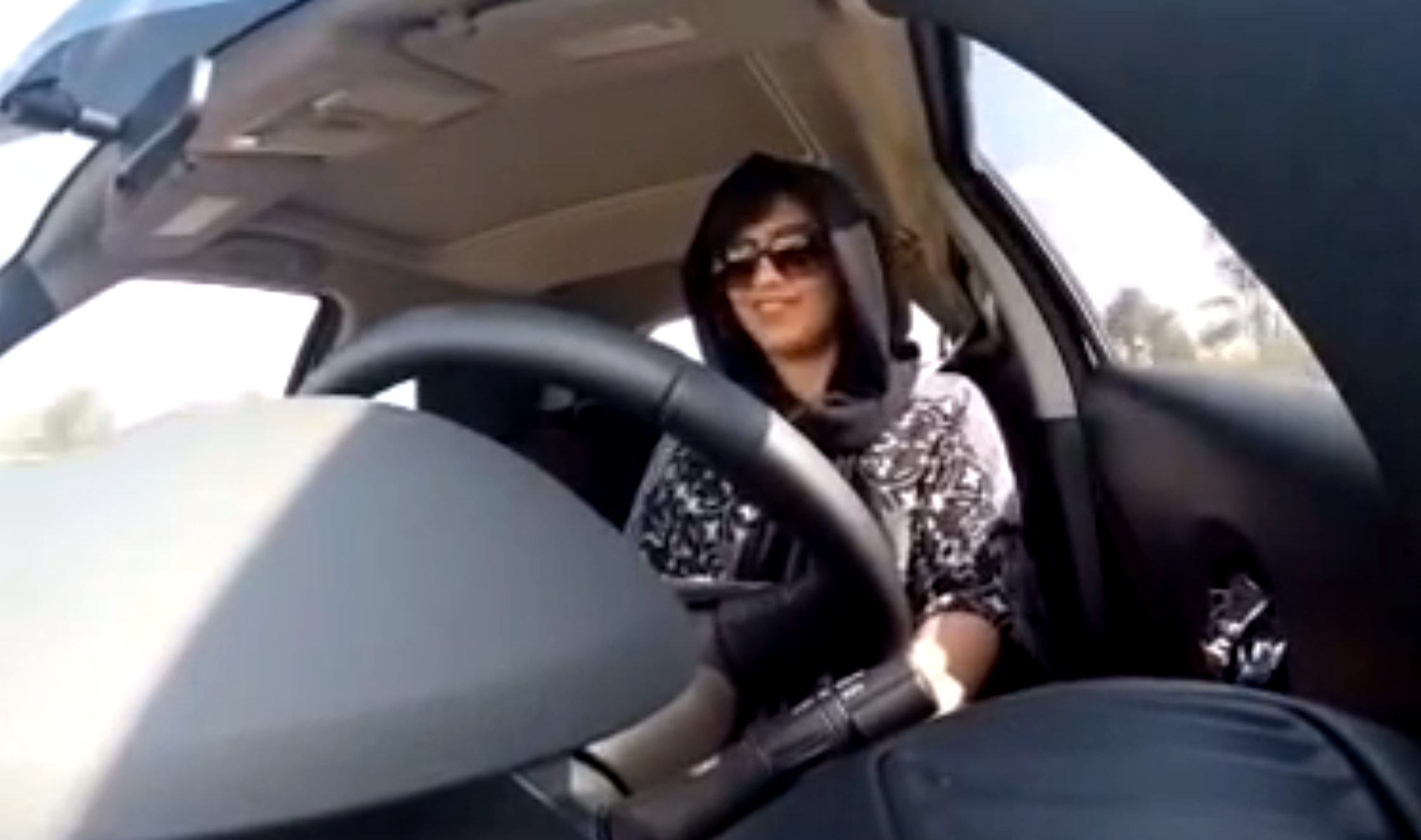 This Nov. 30, 2014, image made from video released by Loujain al-Hathloul, shows her driving toward the United Arab Emirates–Saudi Arabia border before her arrest on Dec. 1, 2014, in Saudi Arabia (Loujain al-Hathloul—AP)