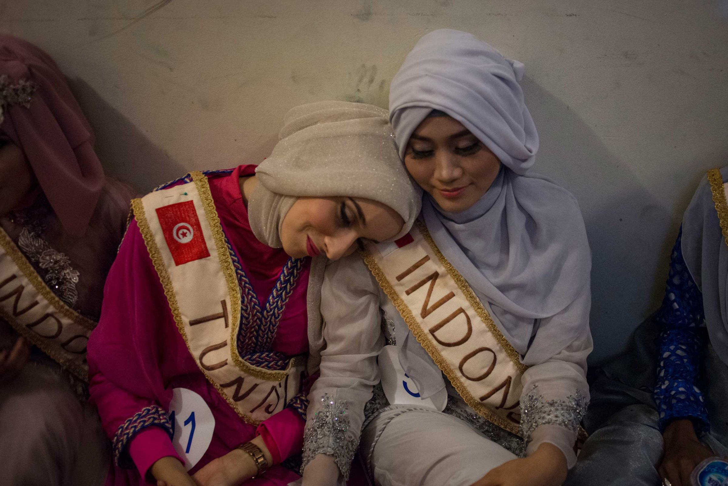The Grand Finale of the Miss Muslimah World Competition, backstage the girls are anxious and exhausted on November 21st, 2014 in Yogakarta, Indonesia. Pictured Muss Tunisia, Fatma Ben Guefrache, and Primadhita Rahma, one of the Indonesian finalists.Miss Muslimah 2014 an award competition in Indonesia, which intends to be the opposite of a beauty pagent.