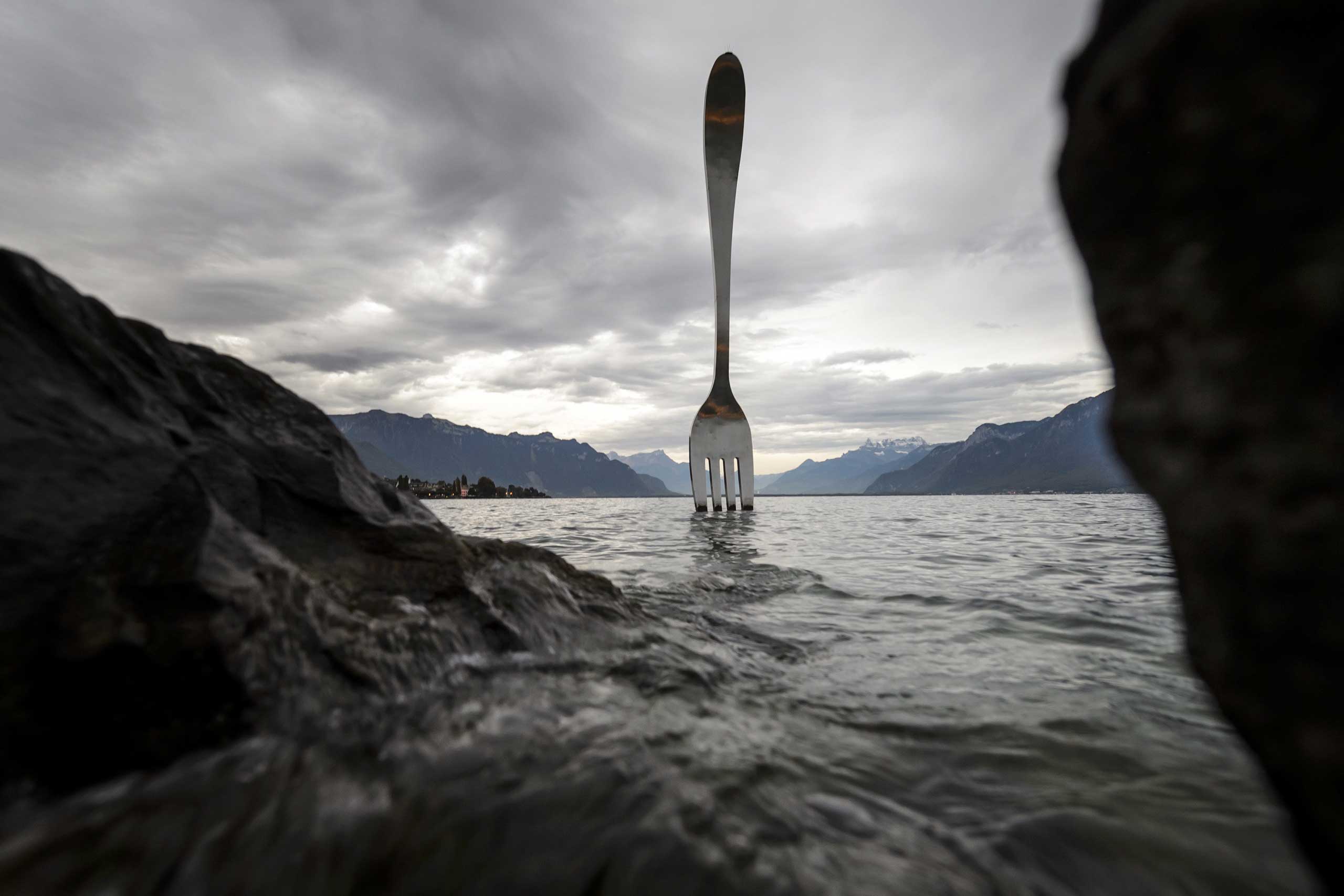 A giant fork designed by  Jean-Pierre Zaugg is set up on Lake Geneva, Switzerland, Oct. 17, 2014.