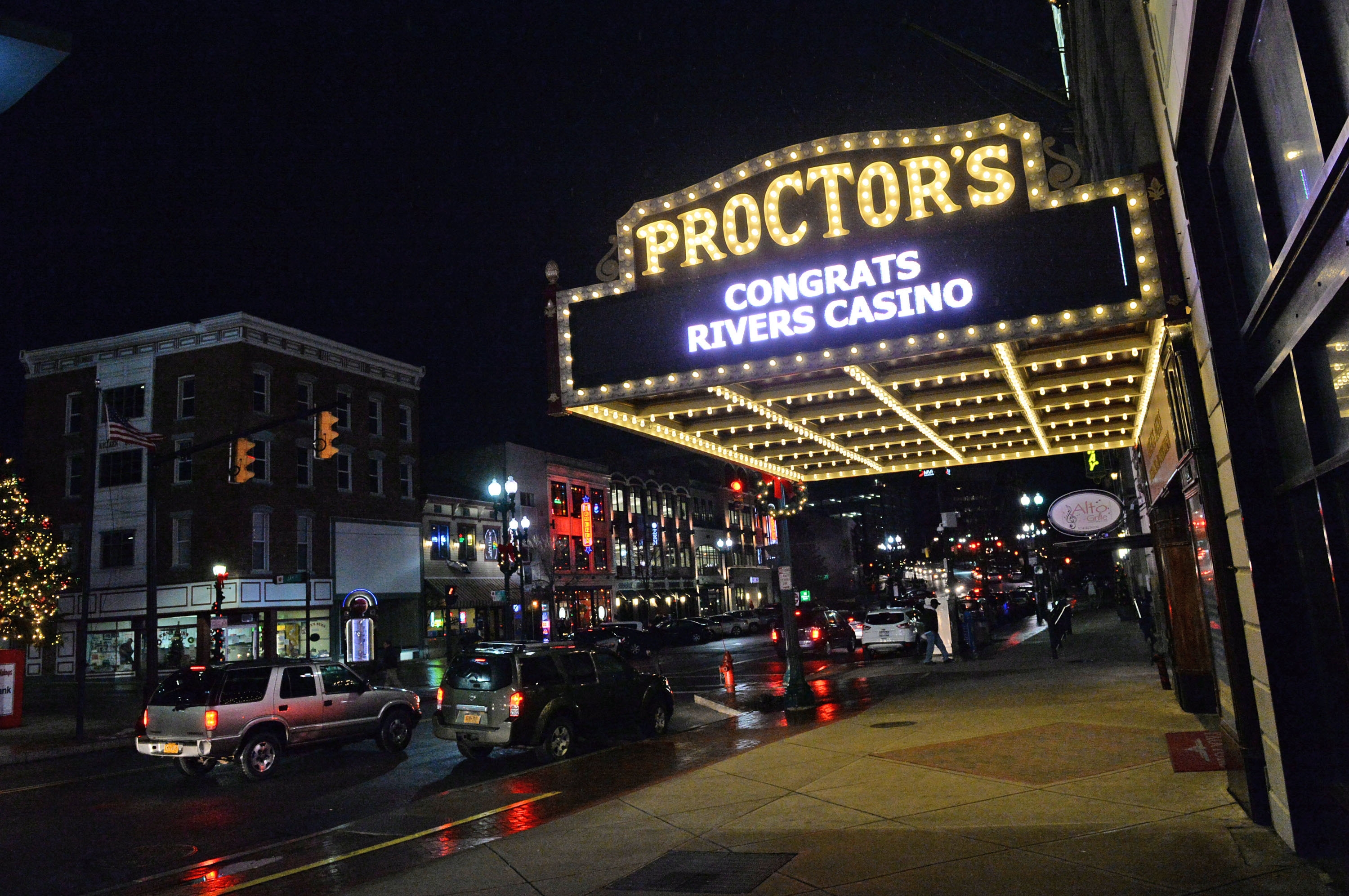 The Proctors Theater marquee displays a celebratory message after a New York State board announced earlier on Dec. 17, 2014, that the former Alco site in  Schenectady, N.Y., would be recommended for a casino (Patrick Dodson—AP)