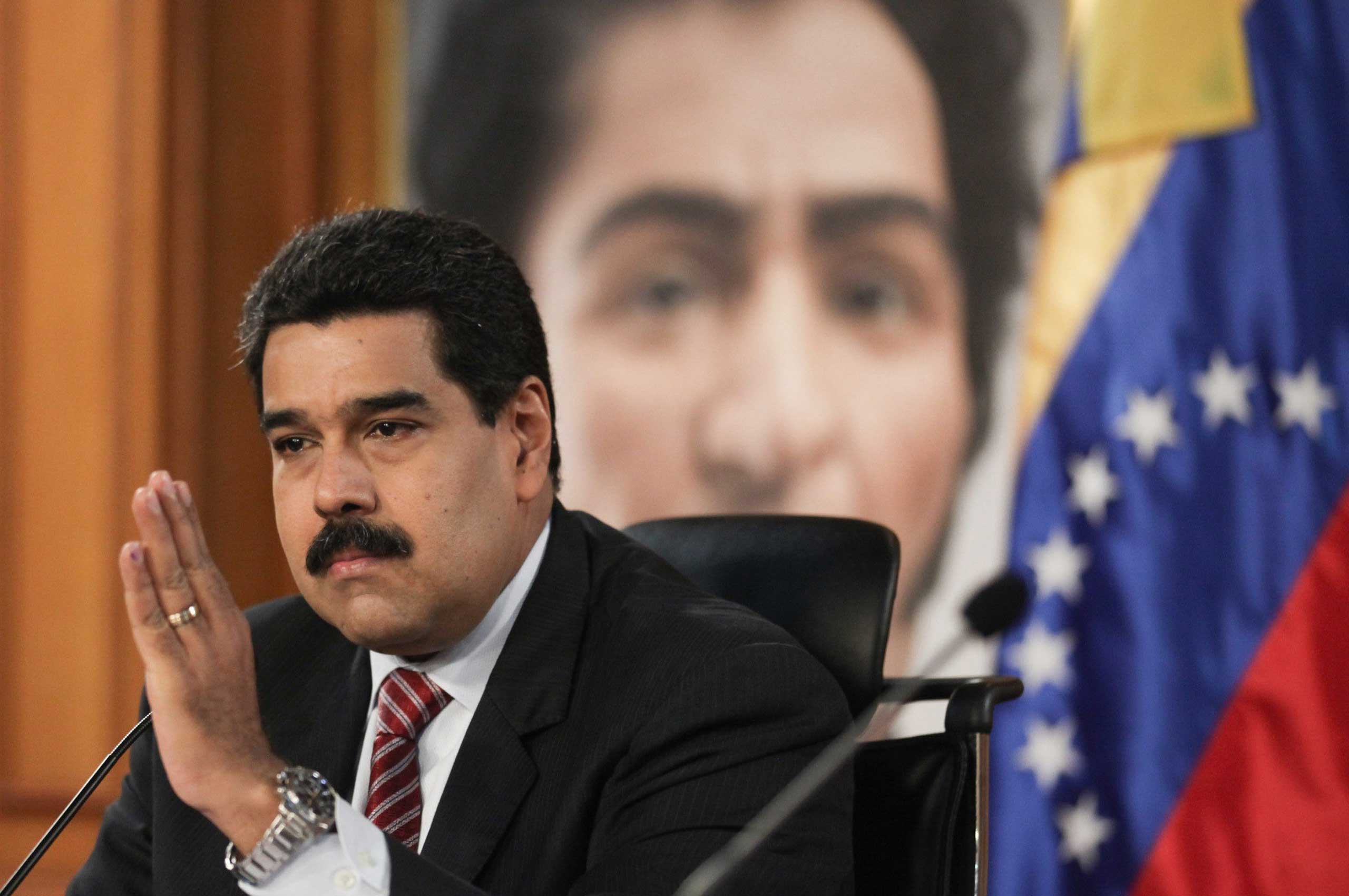 President Nicolas Maduro takes part in a press conference in Caracas, Venezuela, on Dec. 2, 2014. (Corbis)