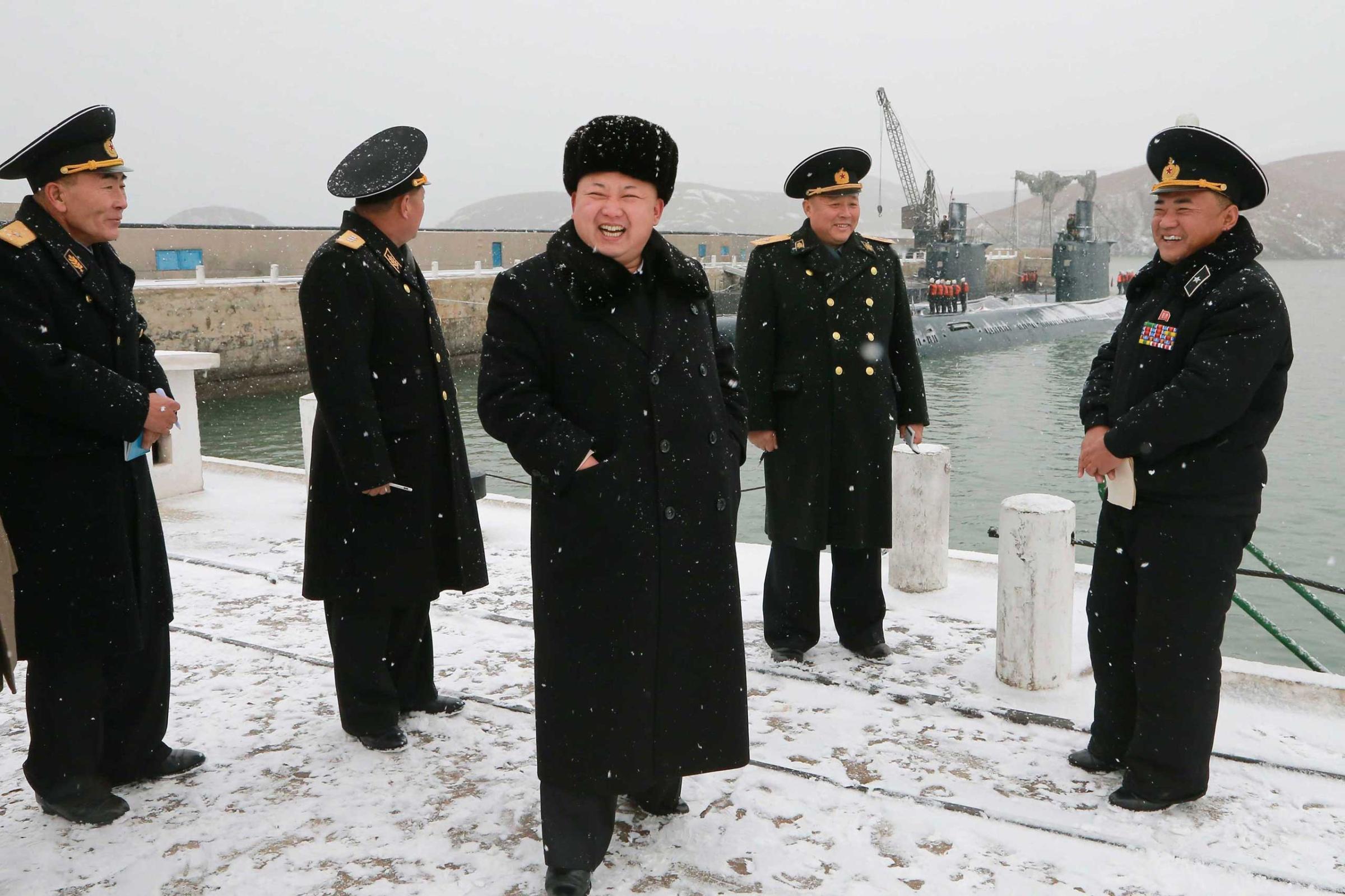 North Korean leader Kim inspects the KPA navy Unit 189 honoured with the title of "O Jung Hup-led 7th Regiment, in this undated photo released by KCNA in Pyongyang