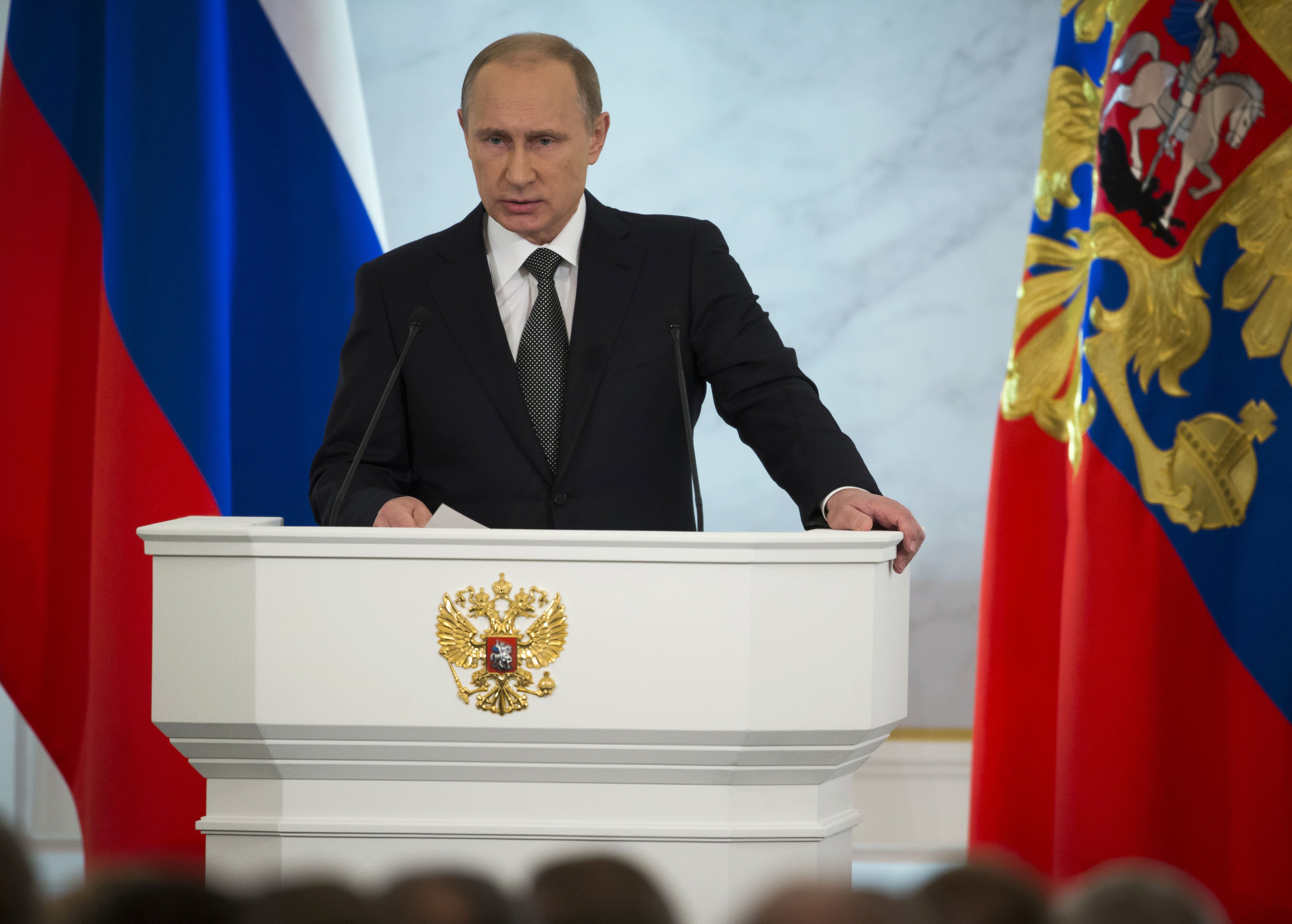 Russian President Vladimir Putin gives his annual state of the nation address in the Kremlin in Moscow on Dec. 4, 2014. (Pavel Golovkin—AP)