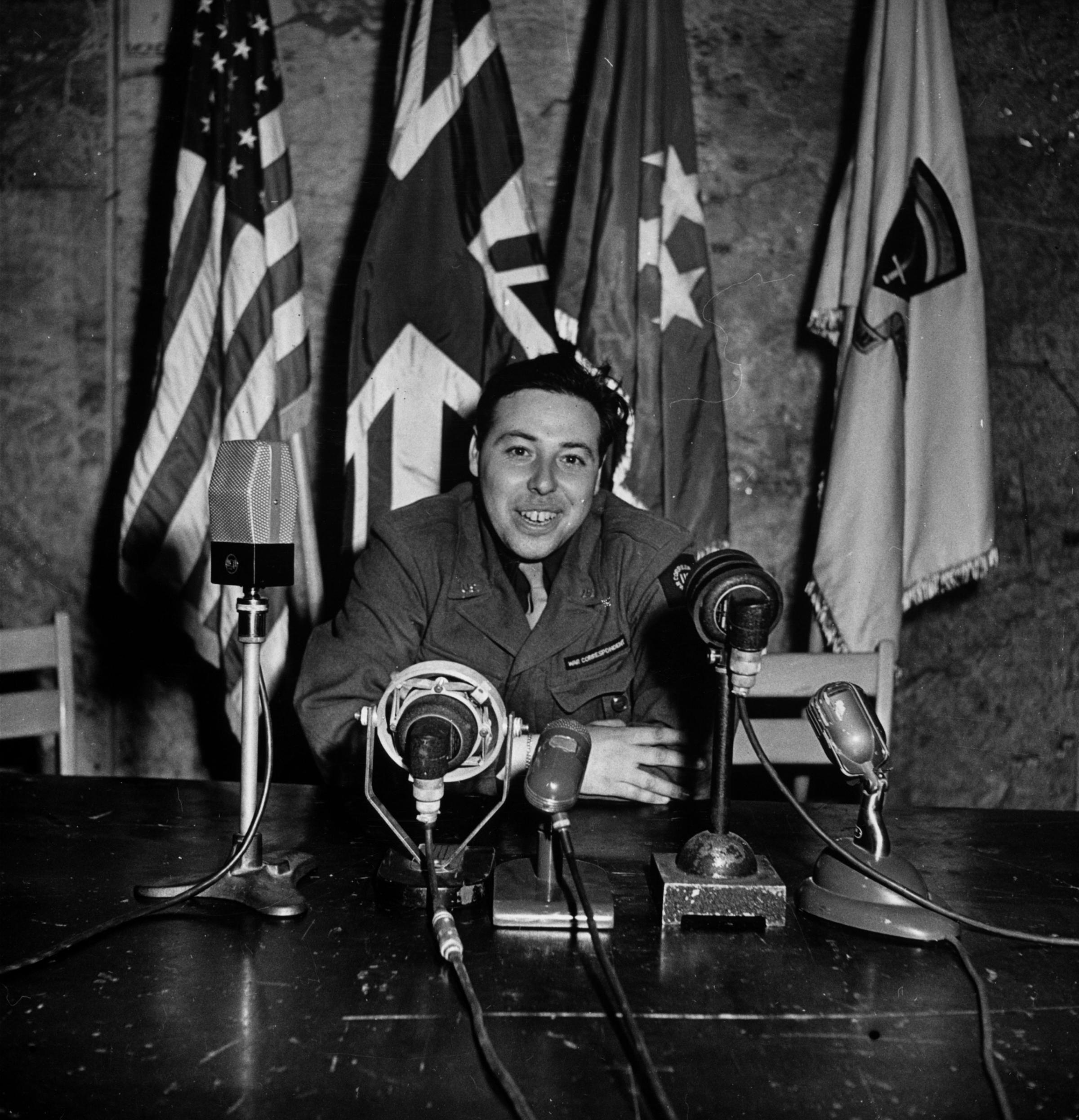 LIFE photographer/war correspondent Ralph Morse's self-portrait in the same chair from which General Eisenhower announced Allied victory in Europe.