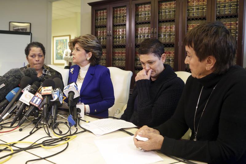 Three women speak about allegations against comedian Bill Cosby as they are accompanied by their attorney during a news conference in Los Angeles