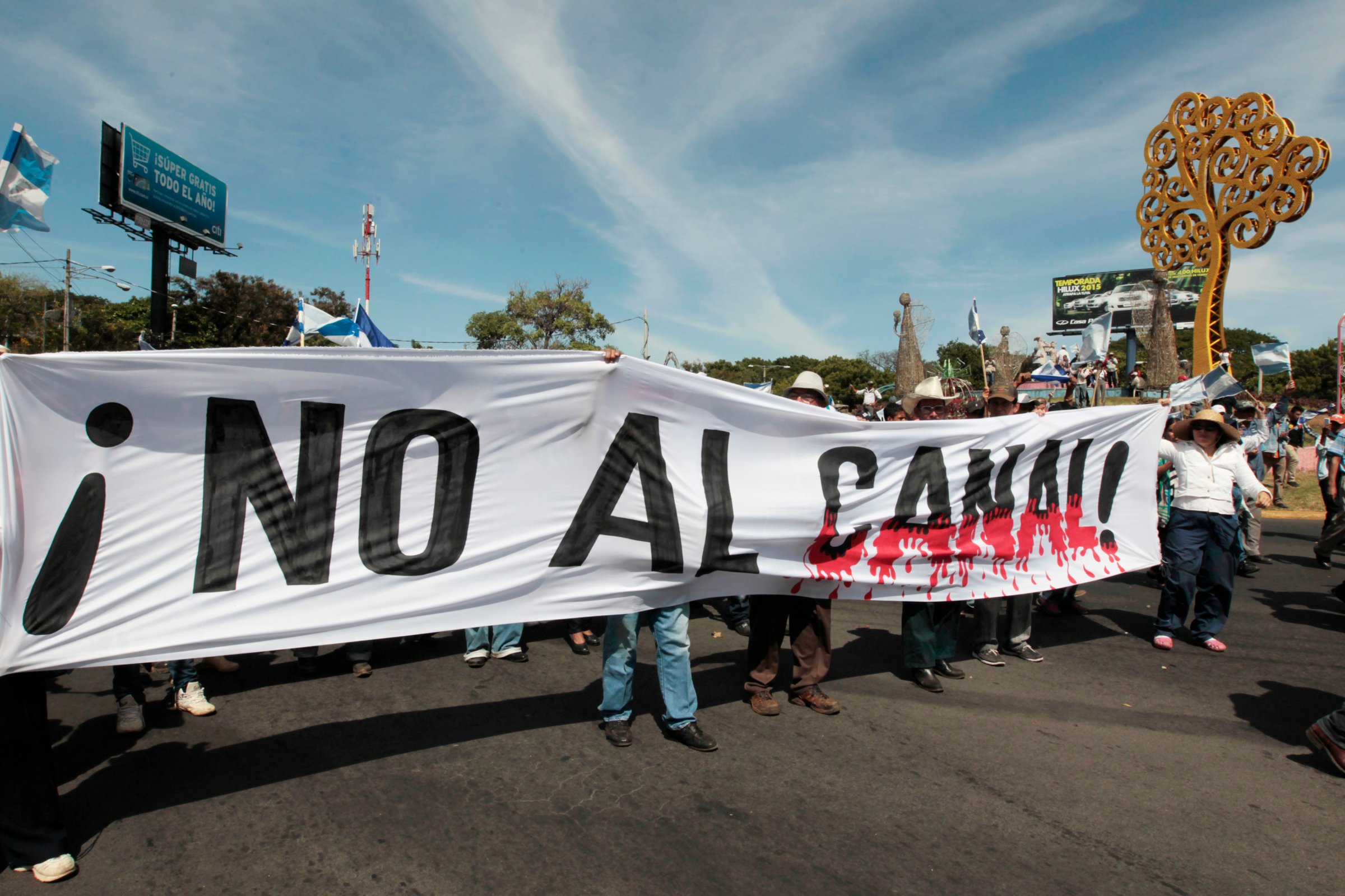 Demonstrators hold a banner during a march to protest against the construction of the Interoceanic Grand Canal in Managua