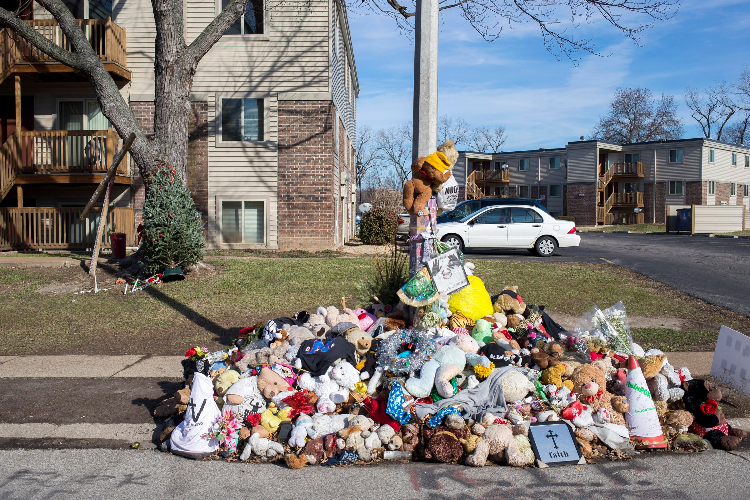 A Christmas tree is seen near a memorial to Michael Brown in Ferguson