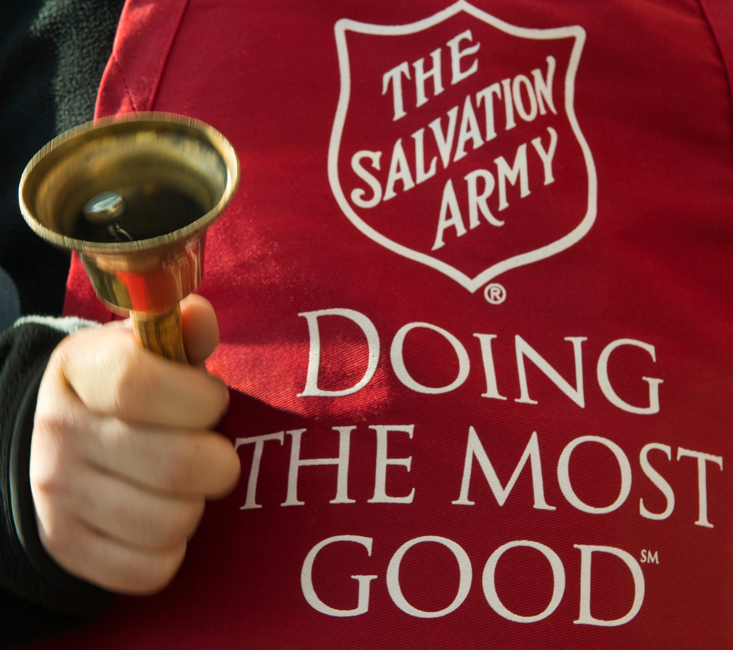 Salvation Army volunteer rings the collection bell outside a grocery store on Nov. 24, 2012 in Clifton, Virginia.