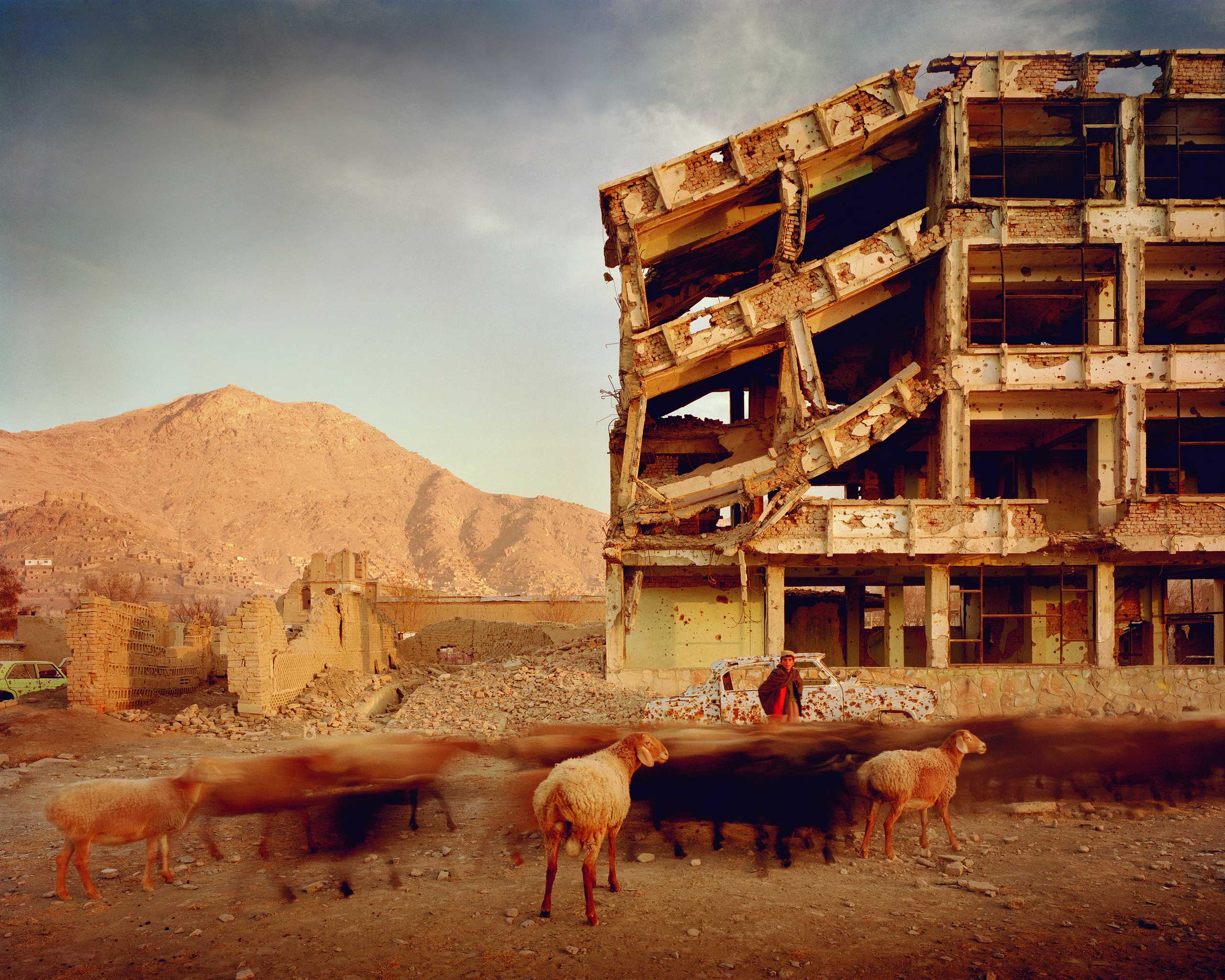 Phaidon blog: War’s effect on peace is examined in new Tate showBullet-scarred apartment building and shops in the Karte Char district of Kabul, Afghanistan, 2003.