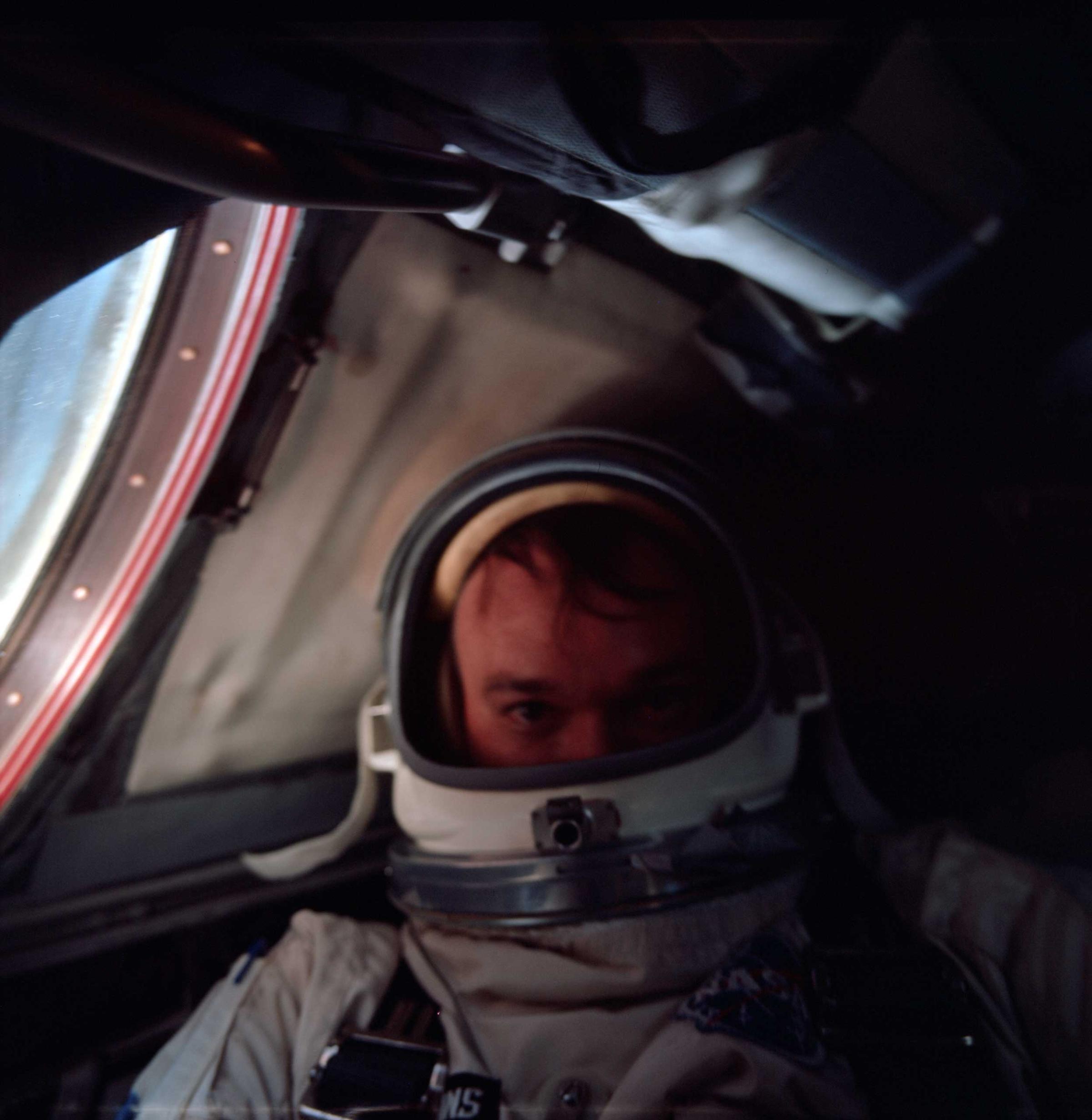 Gemini 10 astronaut Mike Collins takes a selfie in July 1966.
