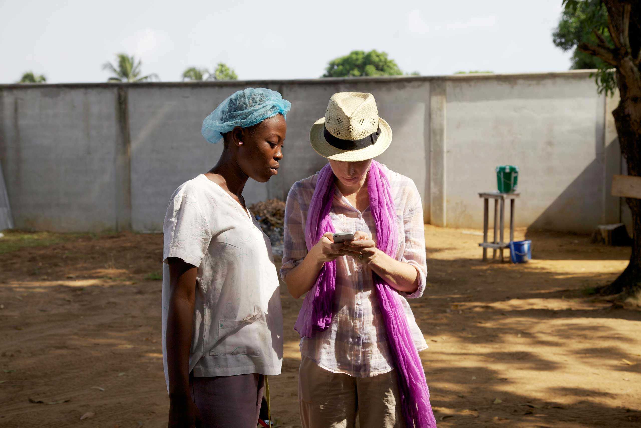 TIME's Africa Bureau Chief Aryn Baker (right) in Monrovia, Liberia (Jackie Nickerson for TIME)