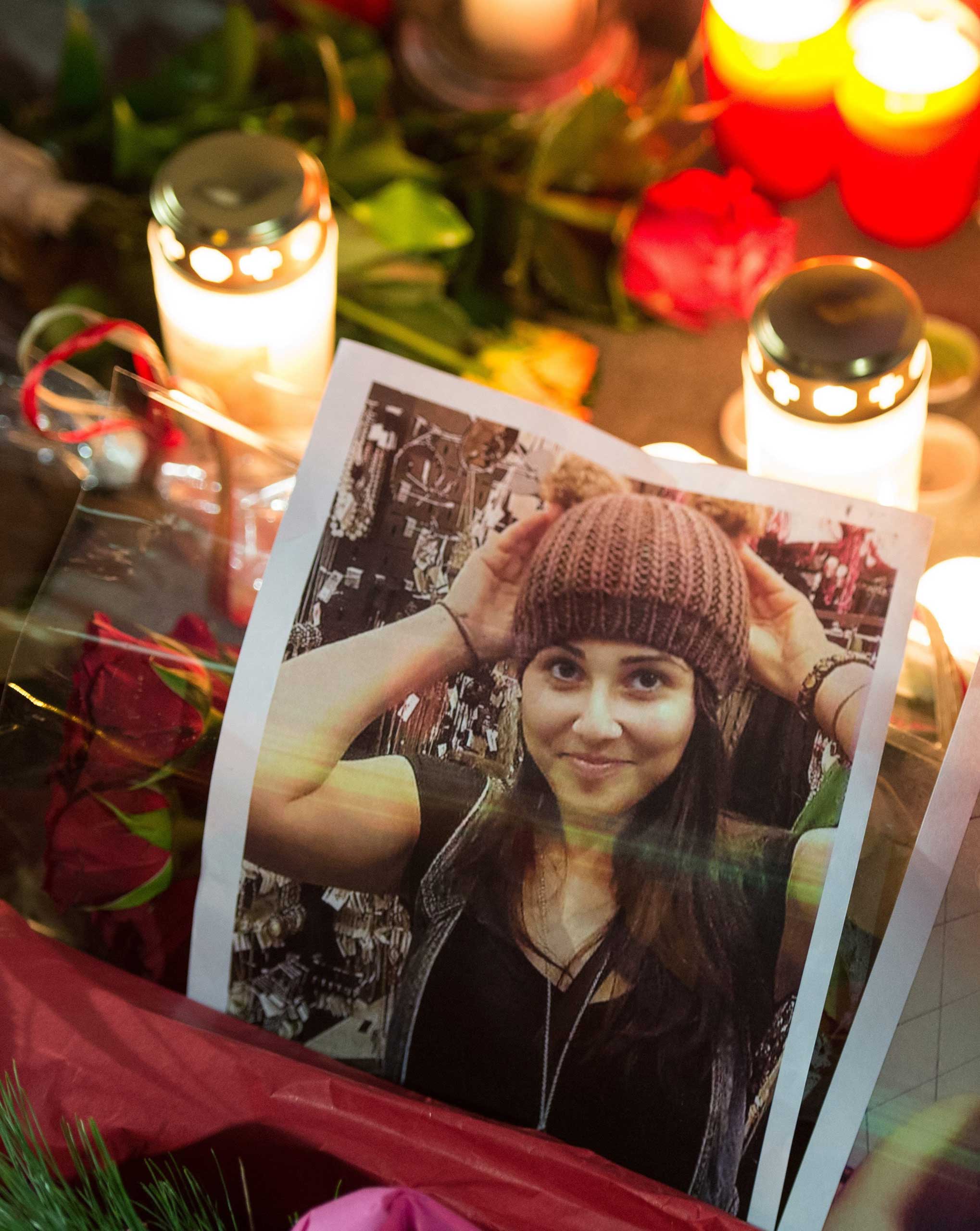Photograph of Tugce Albayrak seen during a vigil outside the hospital that treated her in Offenbach am Mein, Nov. 28, 2014. (Boris Roessler—EPA)