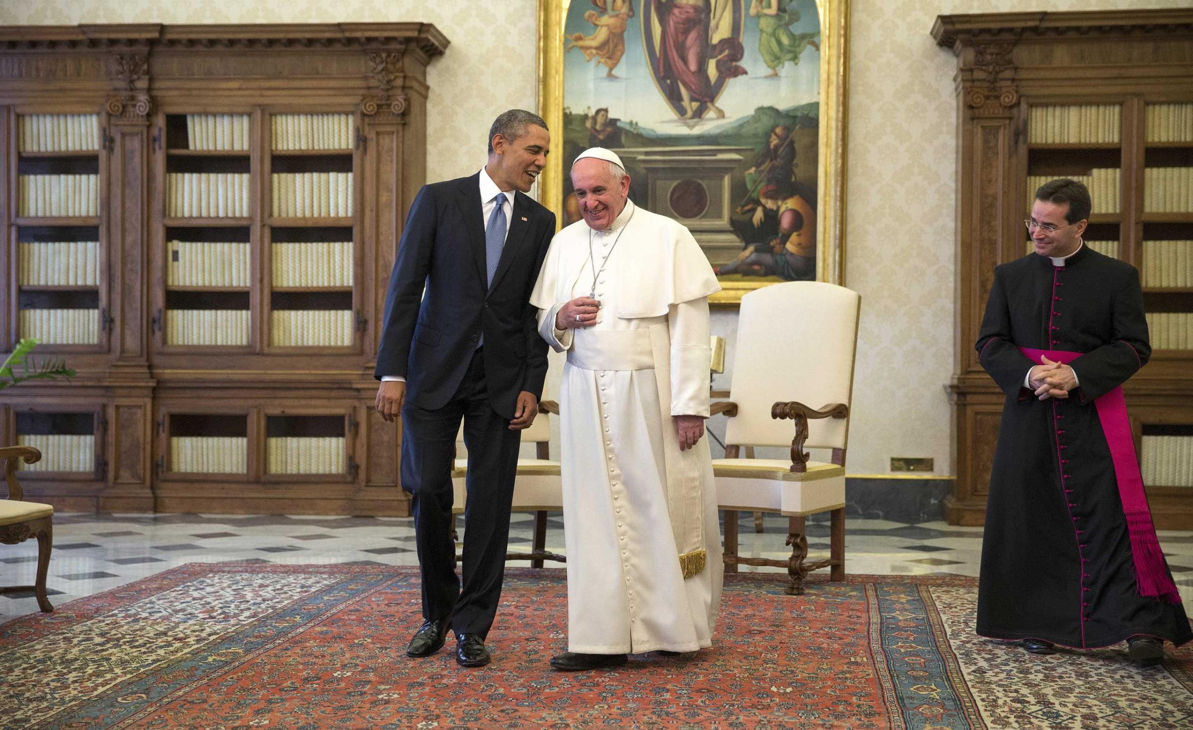President Barack Obama jokes with Pope Francis at the Vatican.