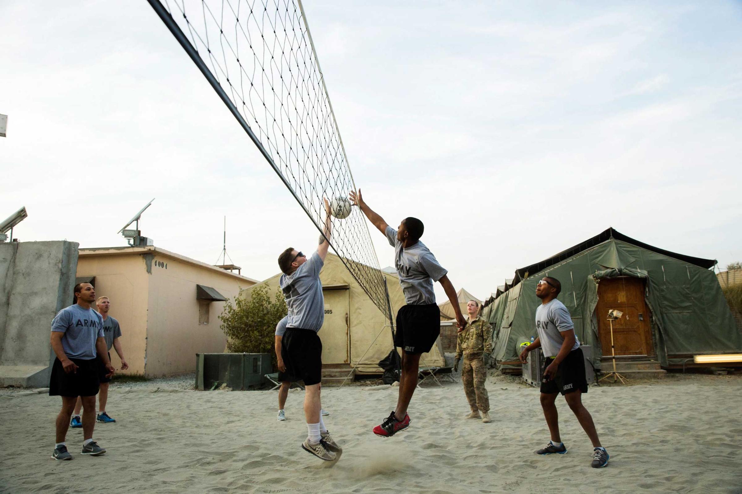 U.S. soldiers play volleyball at forward operating base Fenty in the Nangarhar province of Afghanistan