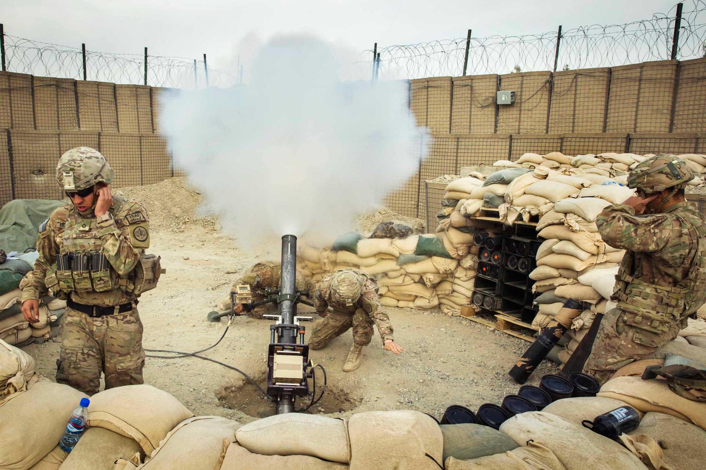 U.S. soldiers from the 3rd Cavalry Regiment fire a 120mm mortar during an exercise on forward operating base Gamberi in the Laghman province of Afghanistan