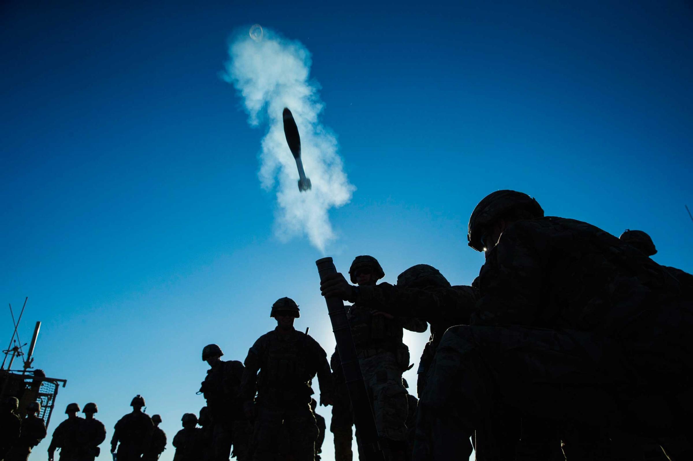 A mortar flies out of a tube during a mortar exercise for U.S. soldiers in Dragon Company of the 3rd Cavalry Regiment near forward operating base Gamberi in the Laghman province of Afghanistan