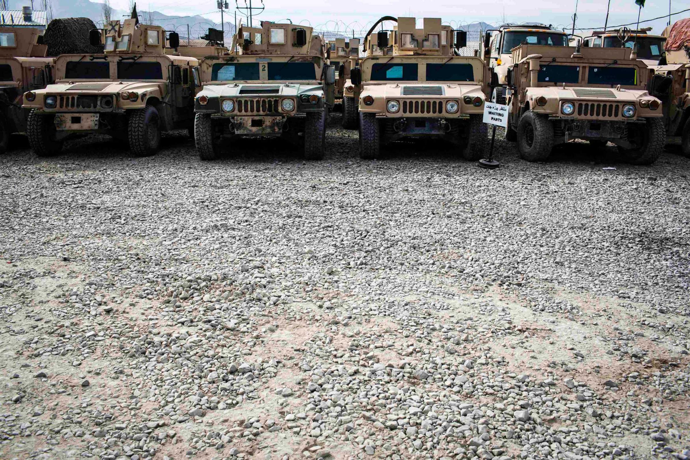 Humvees for the Afghan National Army are lined up waiting for parts to be repaired at the Afghan National Army headquarters for the 203rd Corps in the Paktia province of Afghanistan