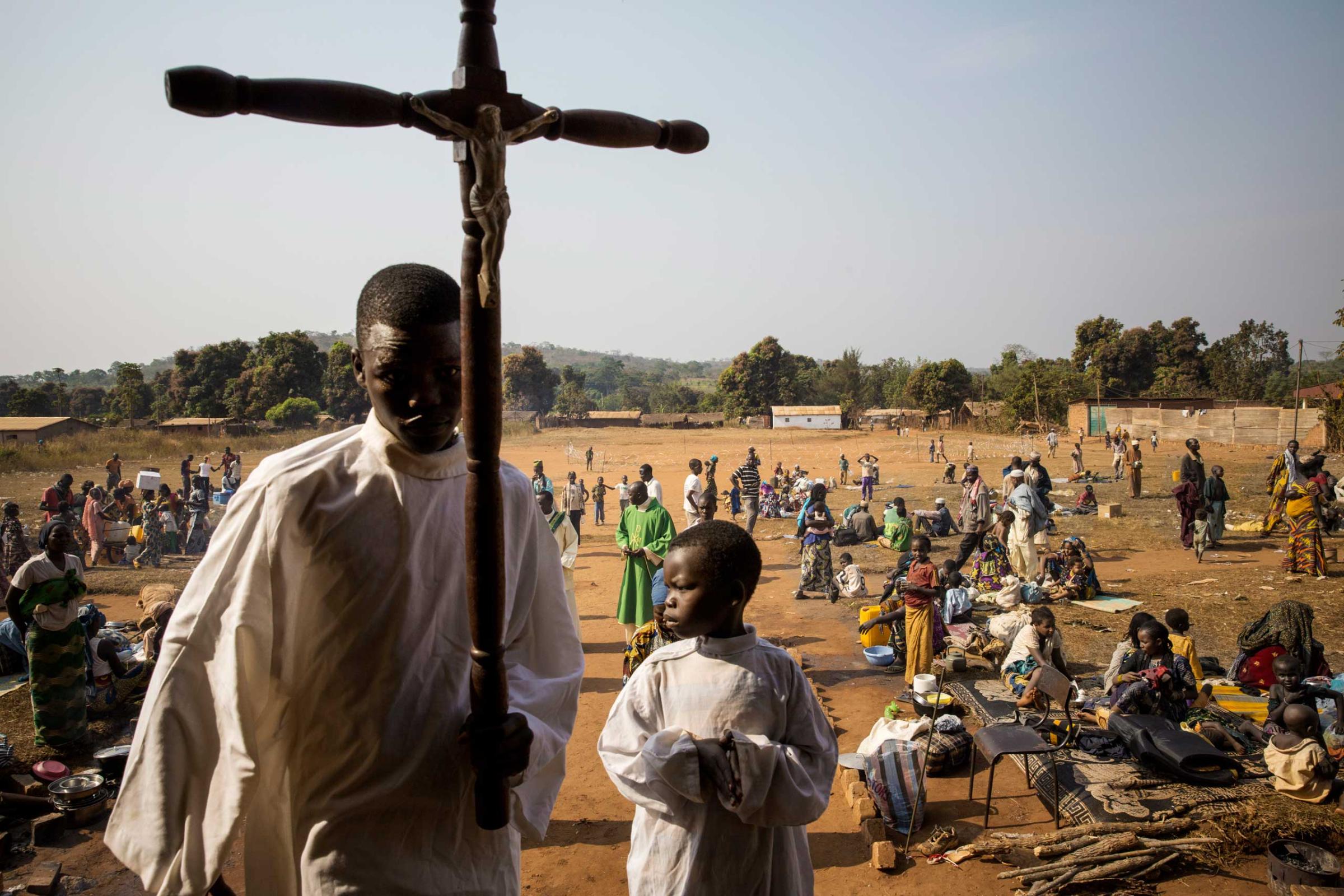 BoaliAn alter boy prepares for a mass at a church where the priest offered sanctuary to a large group of Muslims who were the target of Anti-Balaka forces.