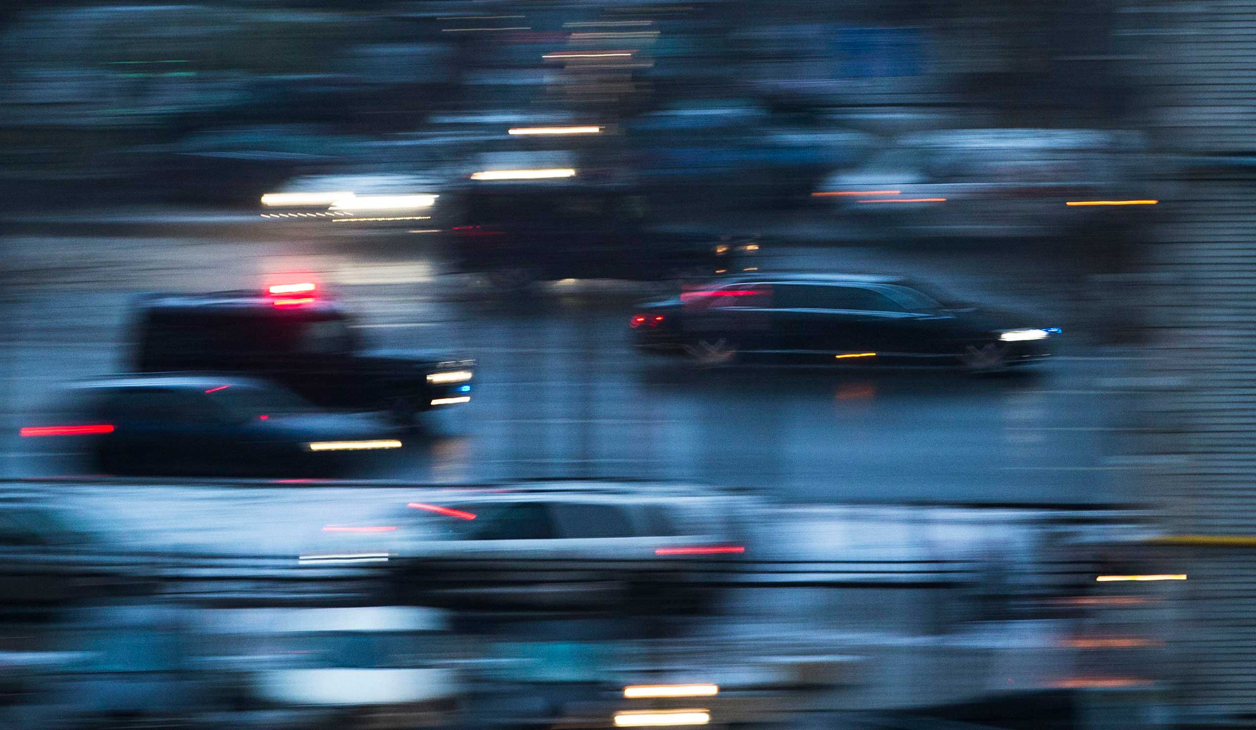 The motorcade carrying Russian President Vladimir Putin speeds up along a highway in downtown Moscow, Russia, Dec. 19, 2014.