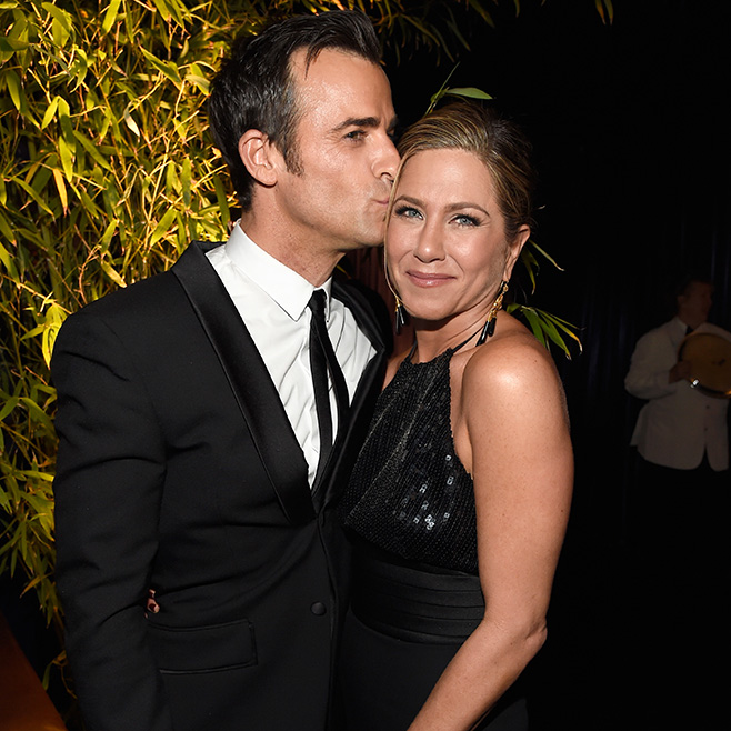 Jennifer Aniston and Justin Theroux Justin Theroux planted a smooch on fiancée Jennifer Aniston (in Yves Saint Laurent). Swoon!