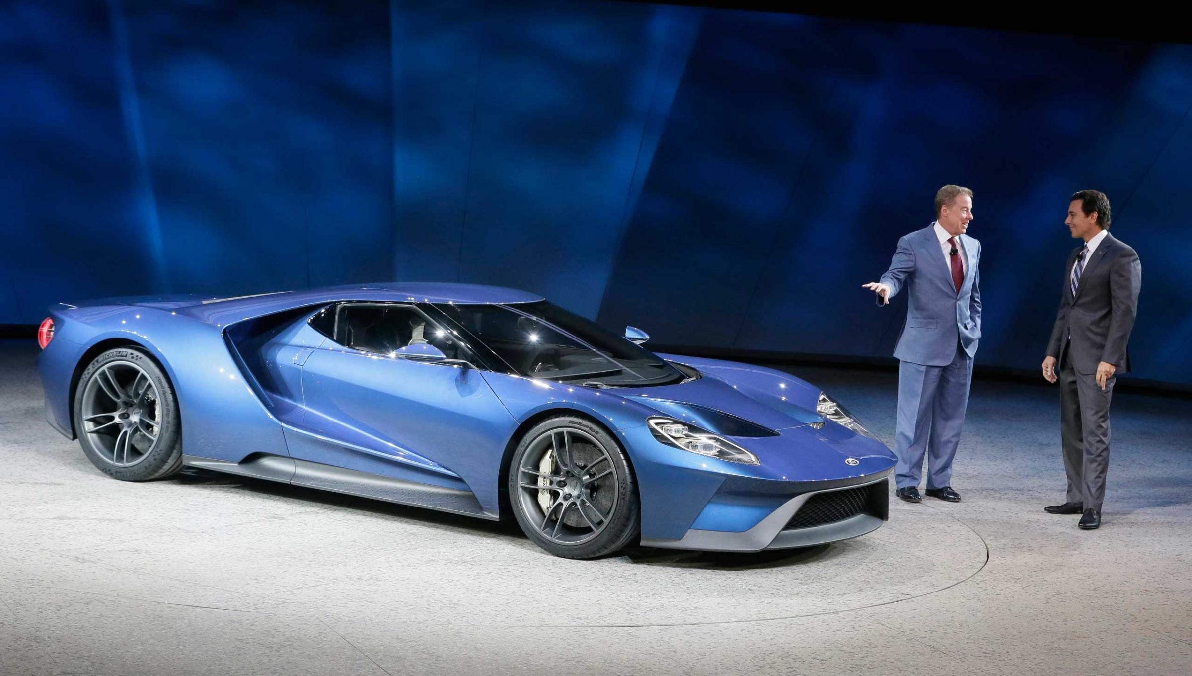 Ford Motor Co., Executive Chairman Bill Ford, left, and President and COO Mark Fields stand next to the new Ford GT on Jan. 12, 2015 in Detroit.
