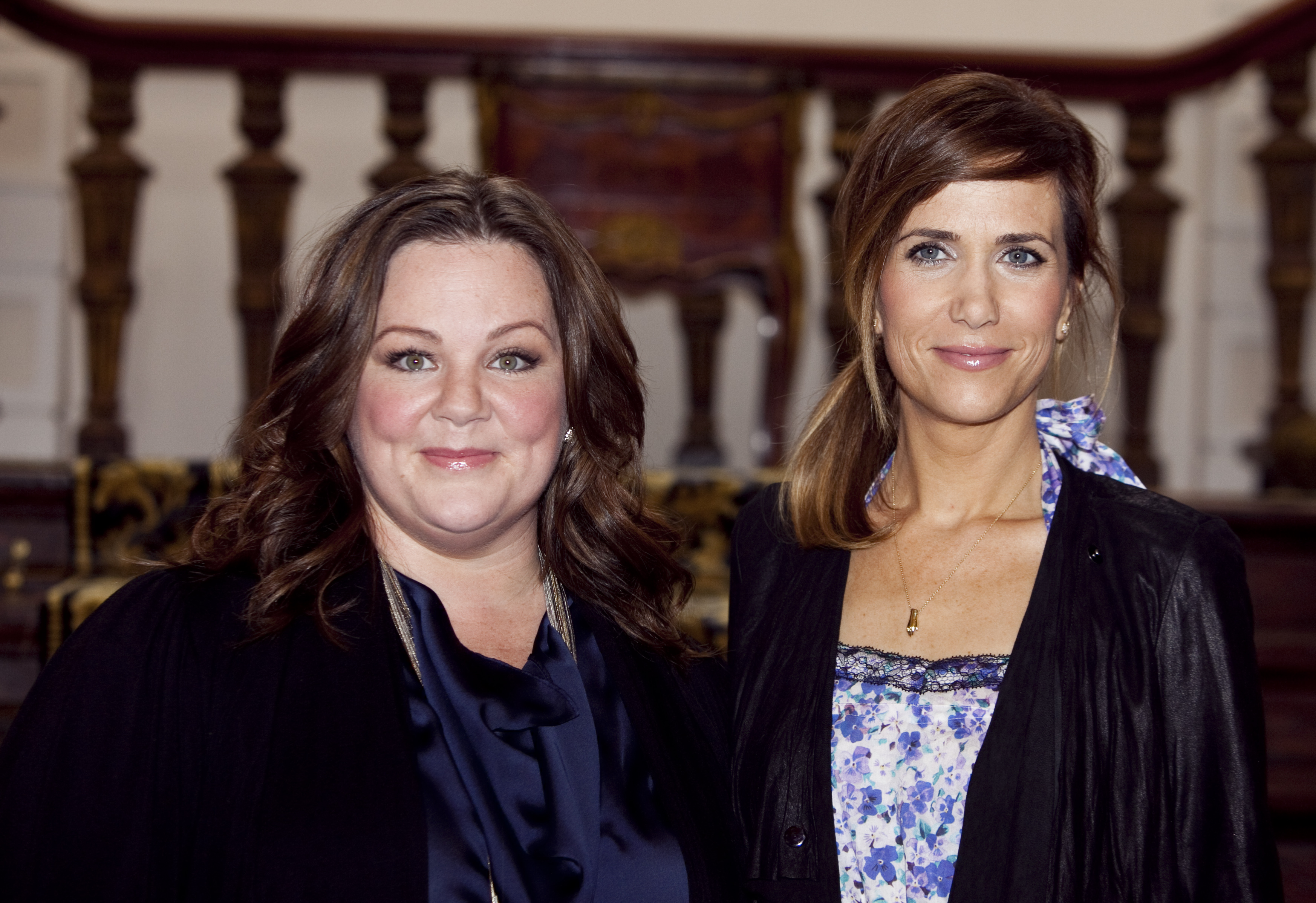 Melissa Mc Carthy and Kristen Wiig attend the photocall for 'Bridesmaids' (Helene Wiesenhaan—Getty Images)