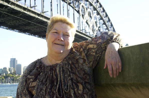Australian author Colleen McCullough in front of the Sydney Harbour Bridge on Aug. 31, 2000 in Sydney, Australia (Peter Carrette Archive—Getty Images)