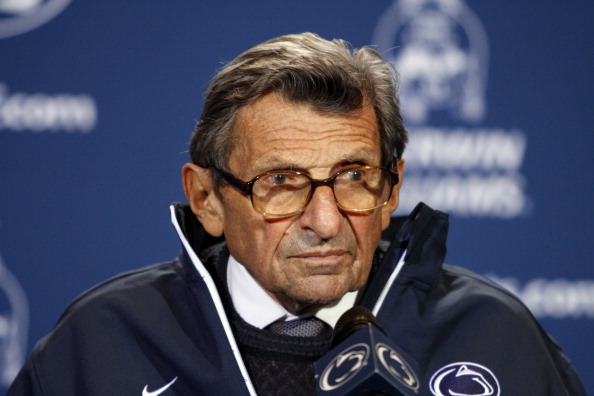 Joe Paterno receives a plaque celebrating his 409th career win at Beaver Stadium in State College, Pa., on Oct. 29, 2011 (Justin K. Aller—Getty Images)