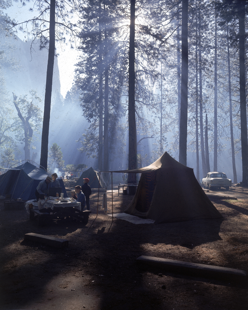 Campers make an early morning breakfast at their site in Yosemite National Park, 1962.