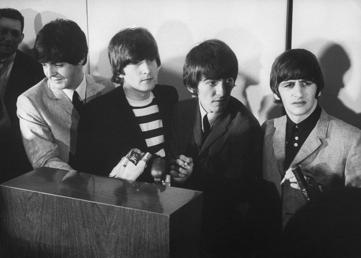 'Beatles' at press conference in San Francisco airport.