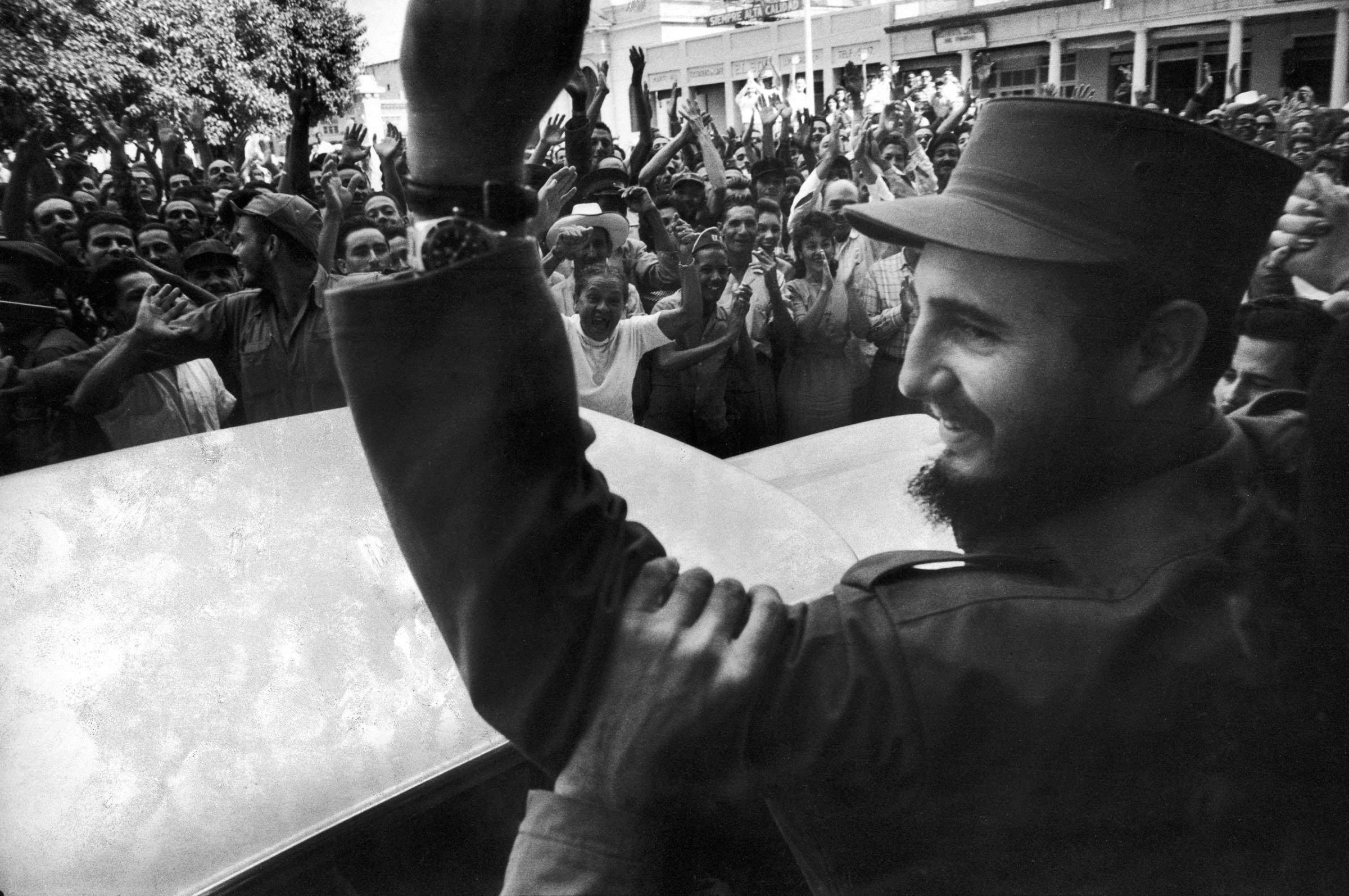 Fidel Castro cheered by crowds on victorious march to Havana after ousting Cuban dictator Fulgencio Batista, 1959.