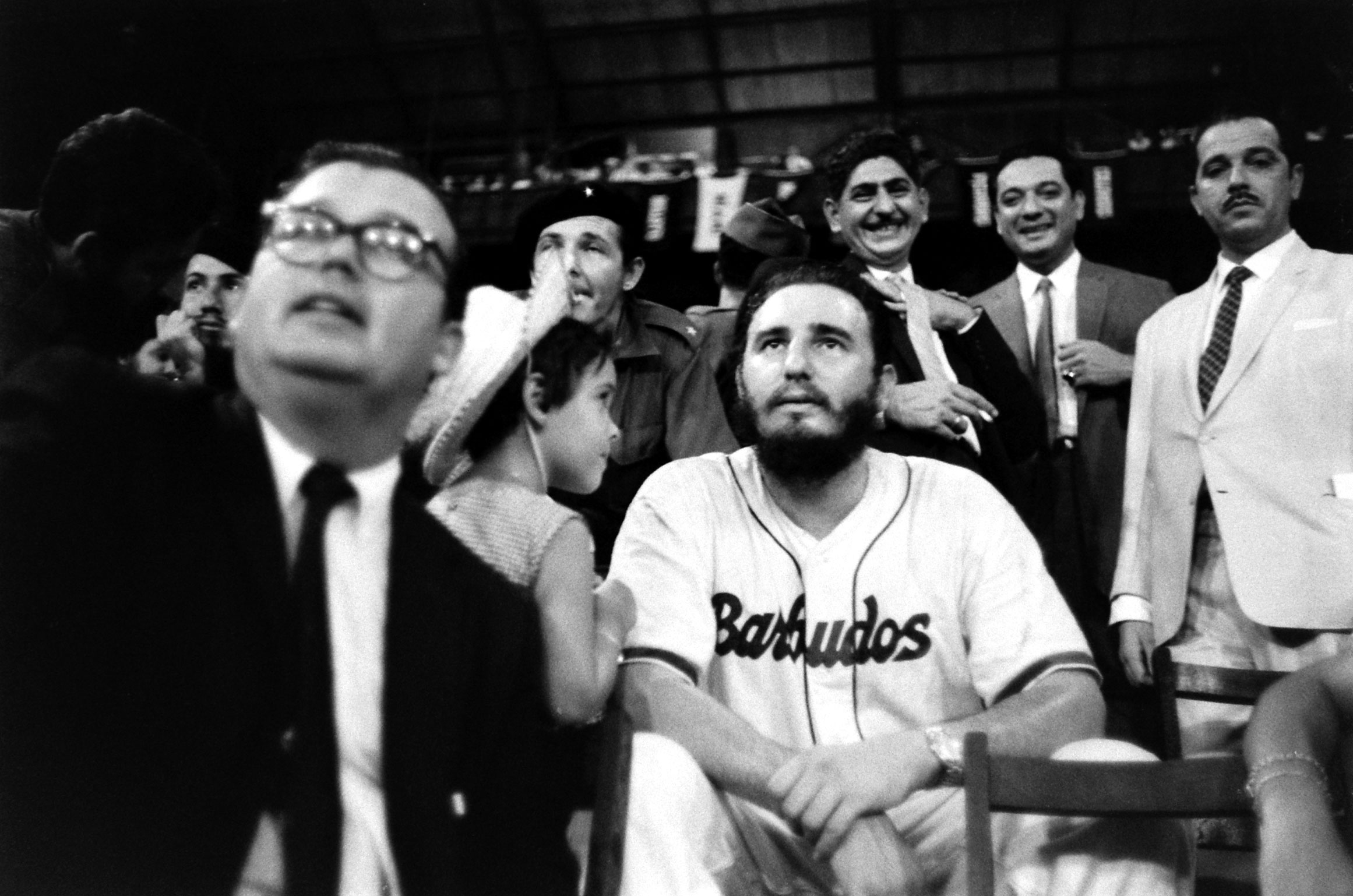 Fidel Castro watches a baseball game, Cuba, 1959.