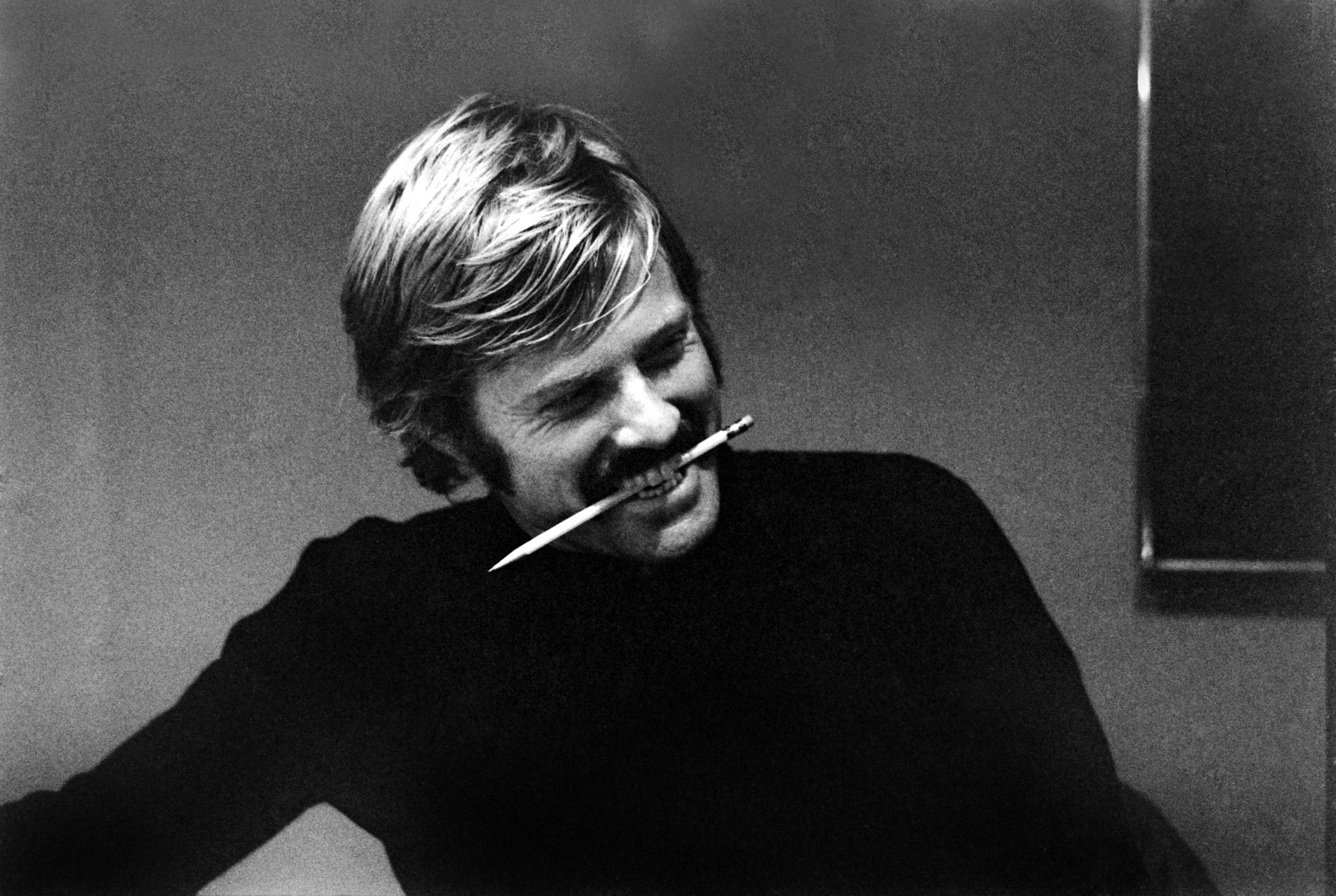 Robert Redford grins in his agent's office in New York 1969