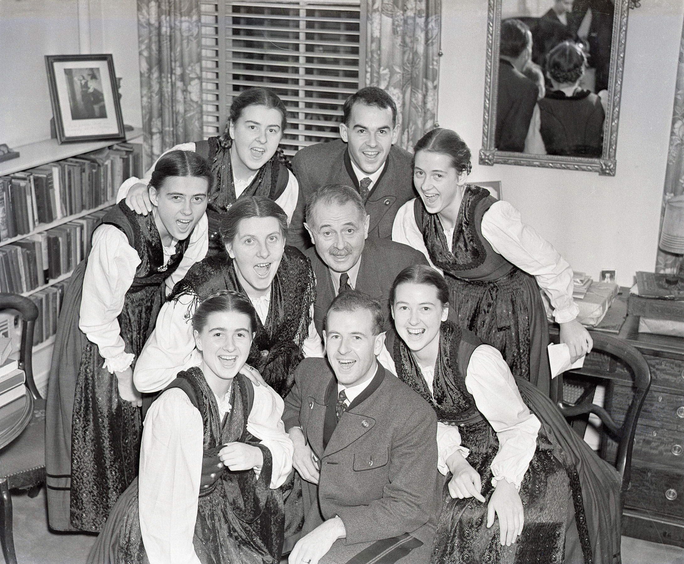 The Von Trapp Family singers warm up before a performance in New York's Town Hall. The musical "The Sound of Music" was based on their life in Austria. December 5, 1938.