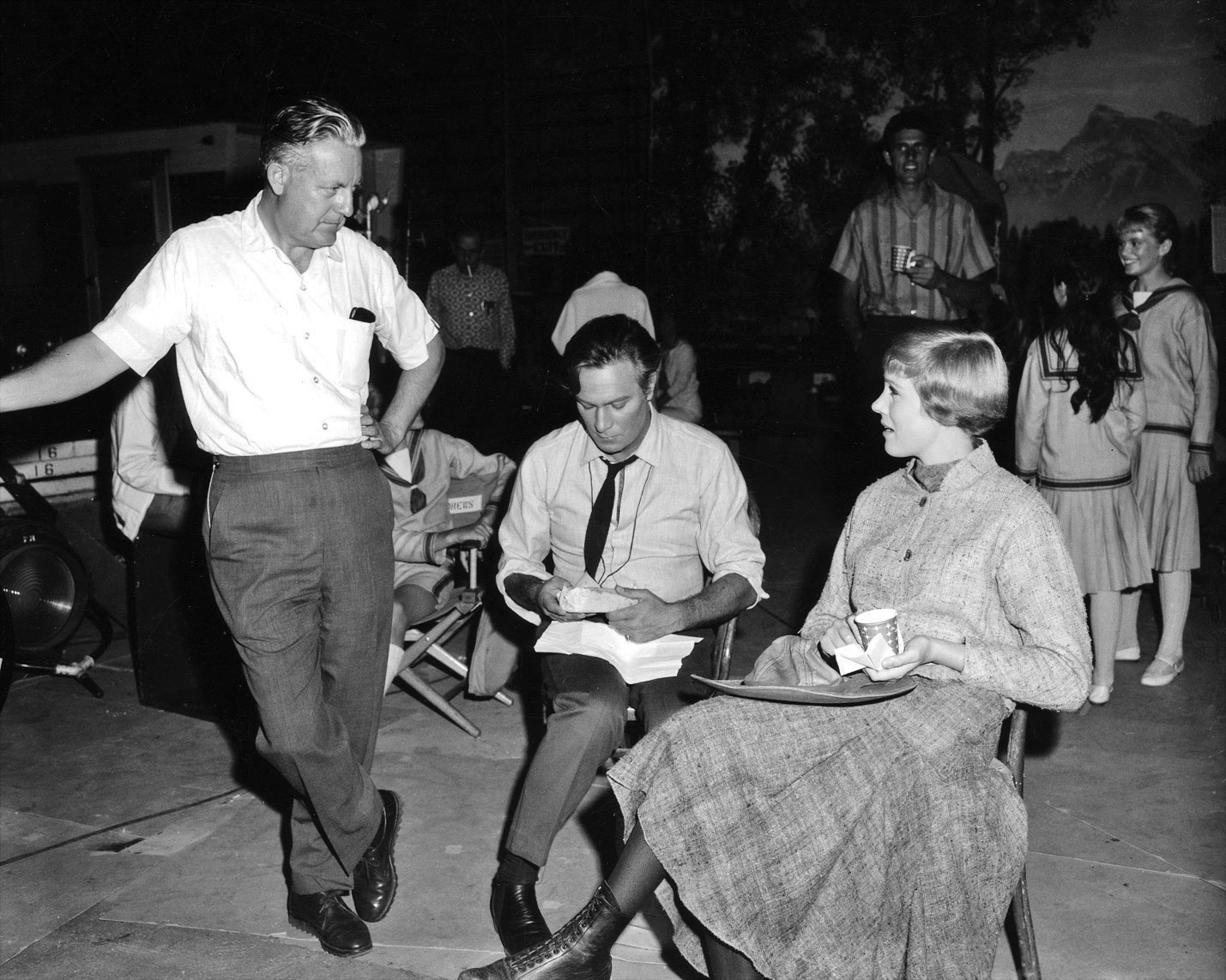 Director Robert Wise, Christopher Plummer, Julie Andrews, on set of The Sound of Music.