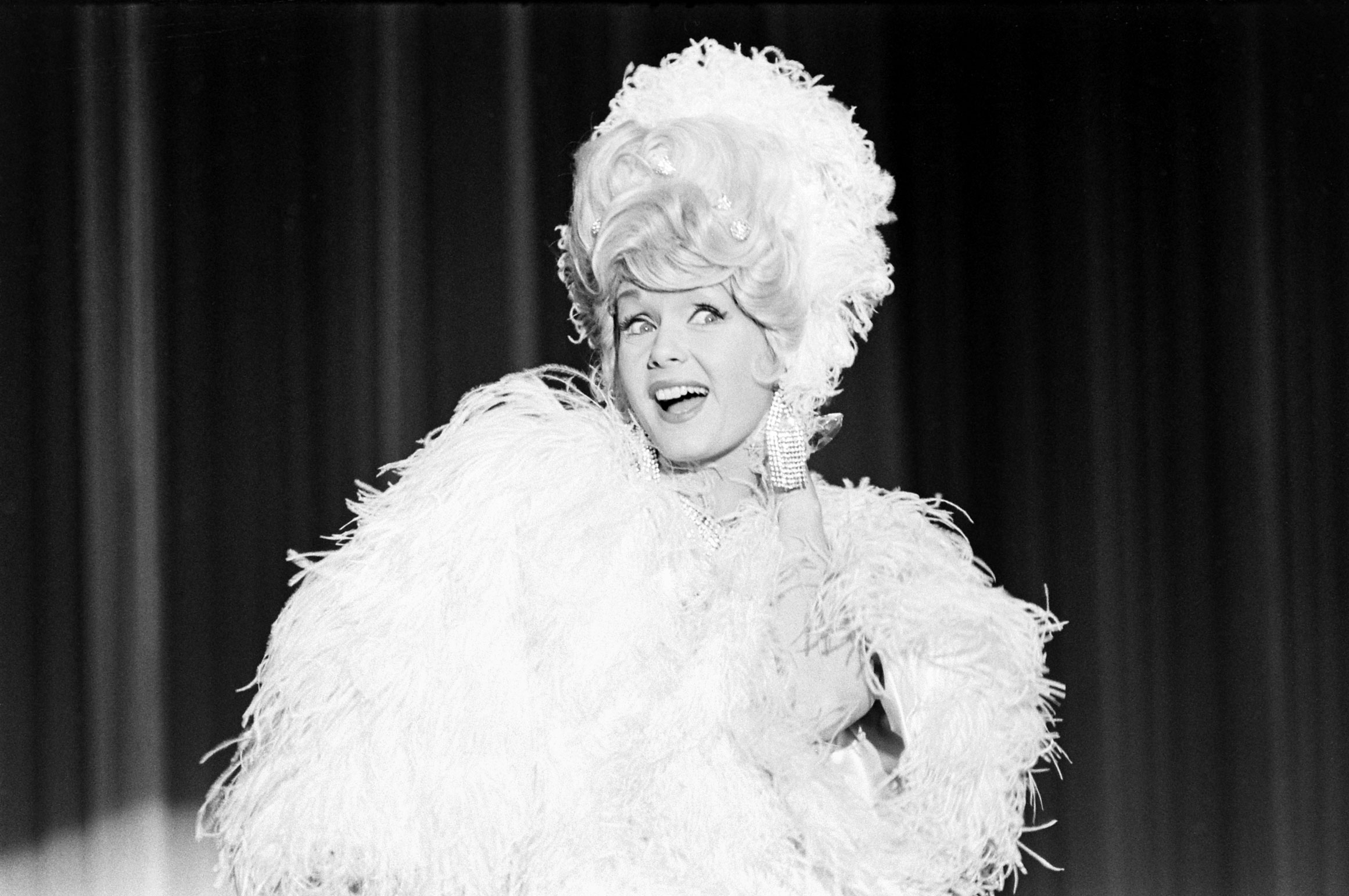 Debbie Reynolds acting as Zsa Zsa Gabor, 1965.