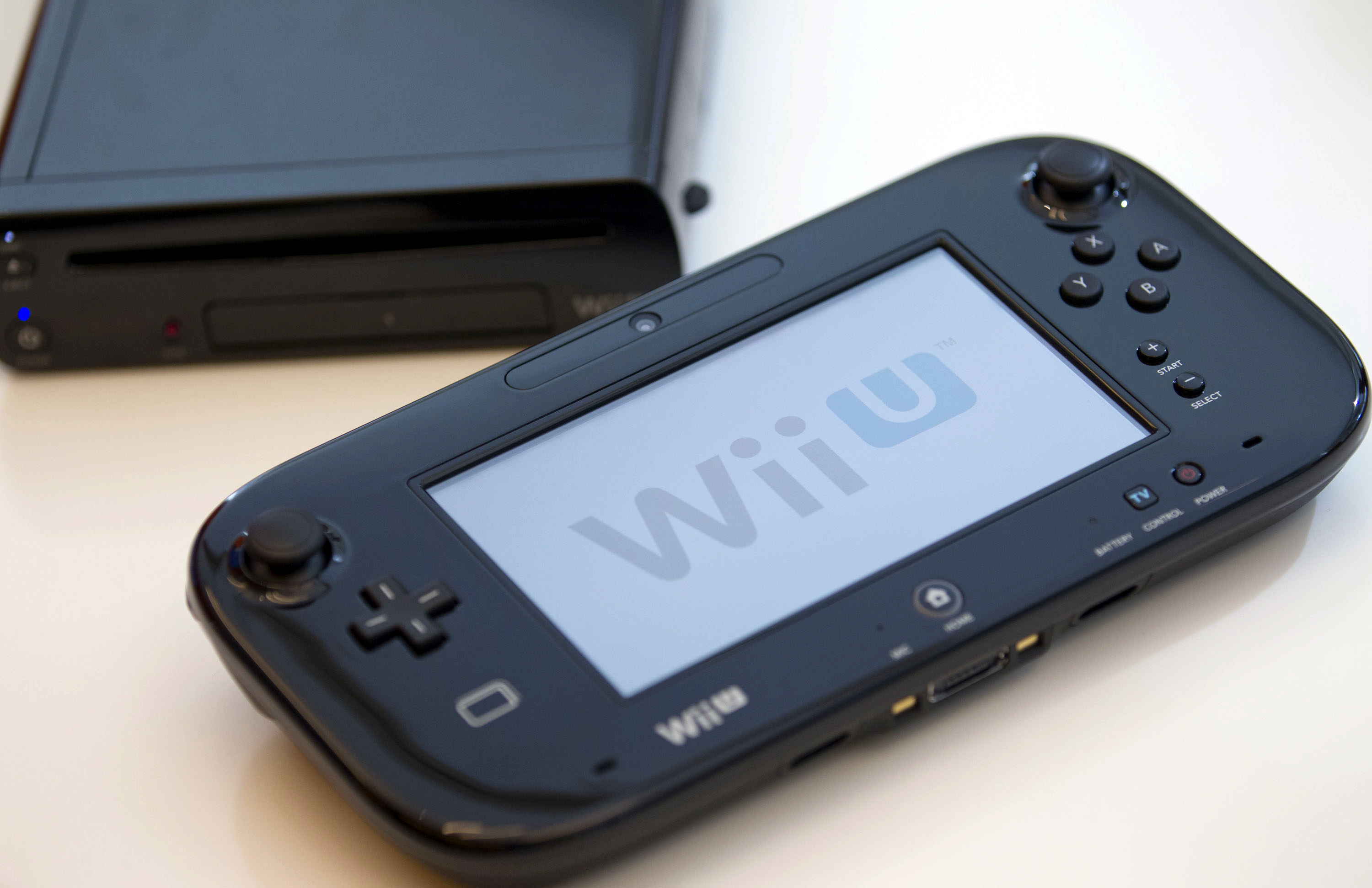 Nintendo's Wii U console, above, and touch-pad controller sit on display during an interview with Reggie Fils-Aime, president of Nintendo of America Inc., in New York, U.S., on Friday, Sept. 14, 2012. (Bloomberg&mdash;Bloomberg via Getty Images)