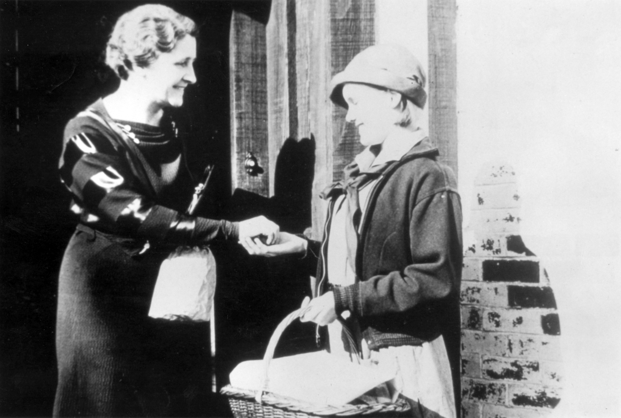 Girl Scouts selling cookies in 1928 (Girl Scouts of the USA)