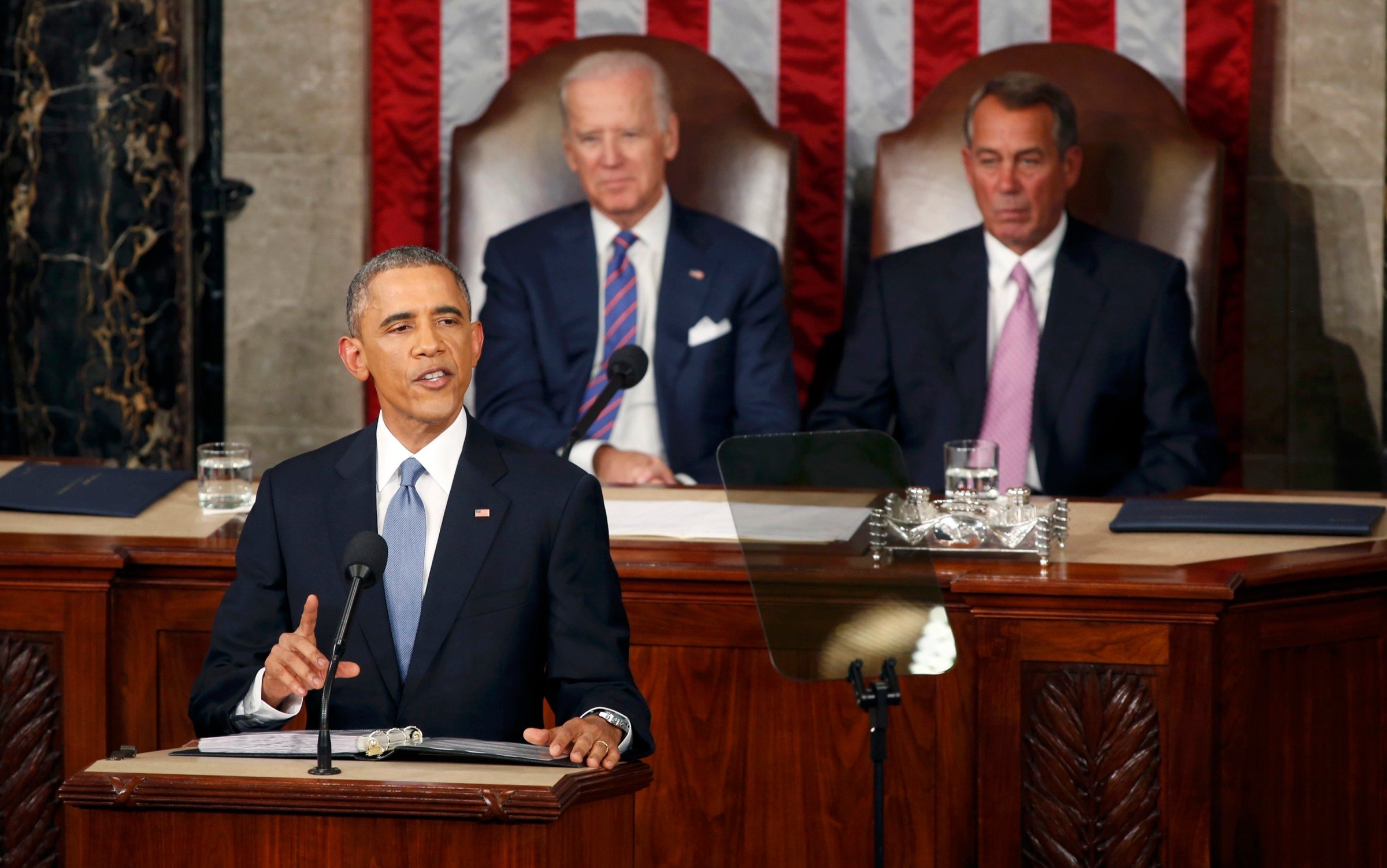 U.S. Vice President Joe Biden and Speaker of the House John Boehner watch as U.S. President Barack Obama delivers his State of the Union address to a joint session of the U.S. Congress on Capitol Hill in Washington on Jan. 20, 2015.