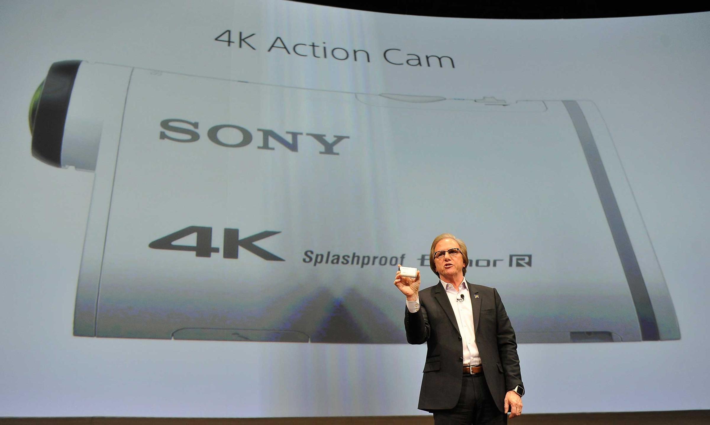 Sony Electronics President and COO Mike Fasulo displays the Sony 4K Action Cam at a press event on Jan. 5, 2015.