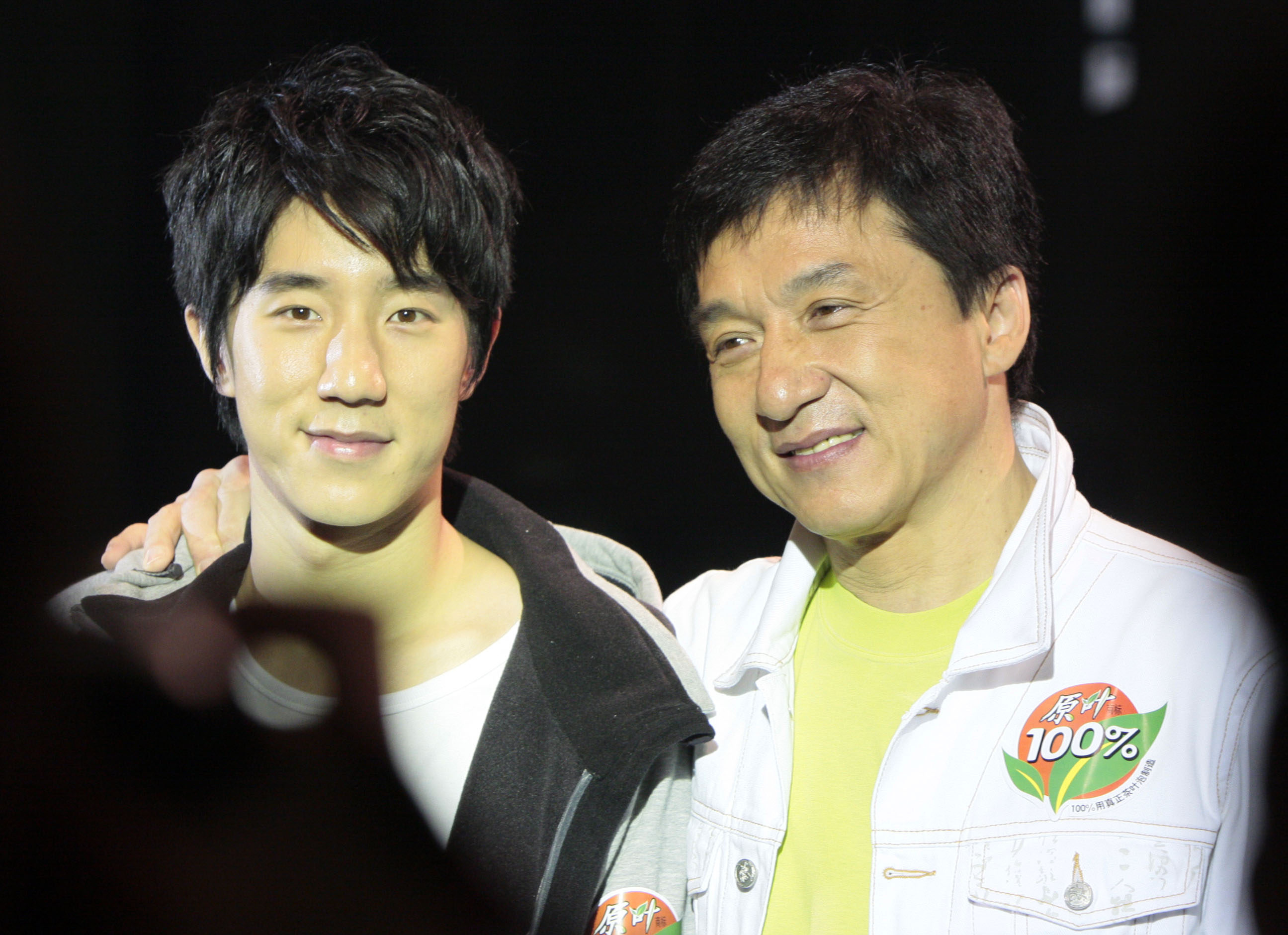 Jackie Chan and his son Jaycee Chan attends a commercial event on April 5, 2008, in Shanghai (ChinaFotoPress/Getty Images)