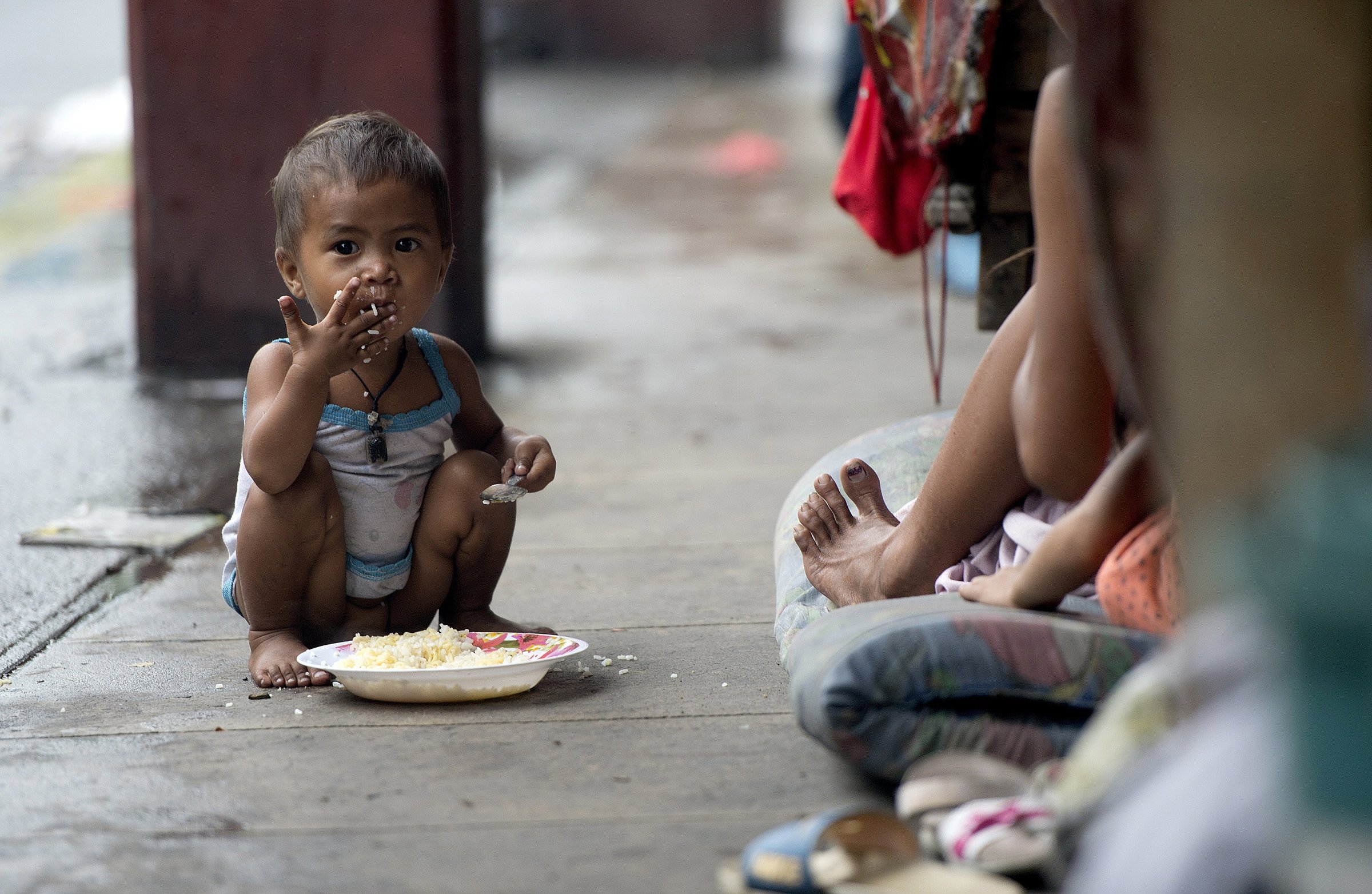 A homeless child in the streets of Manila in 2014.
