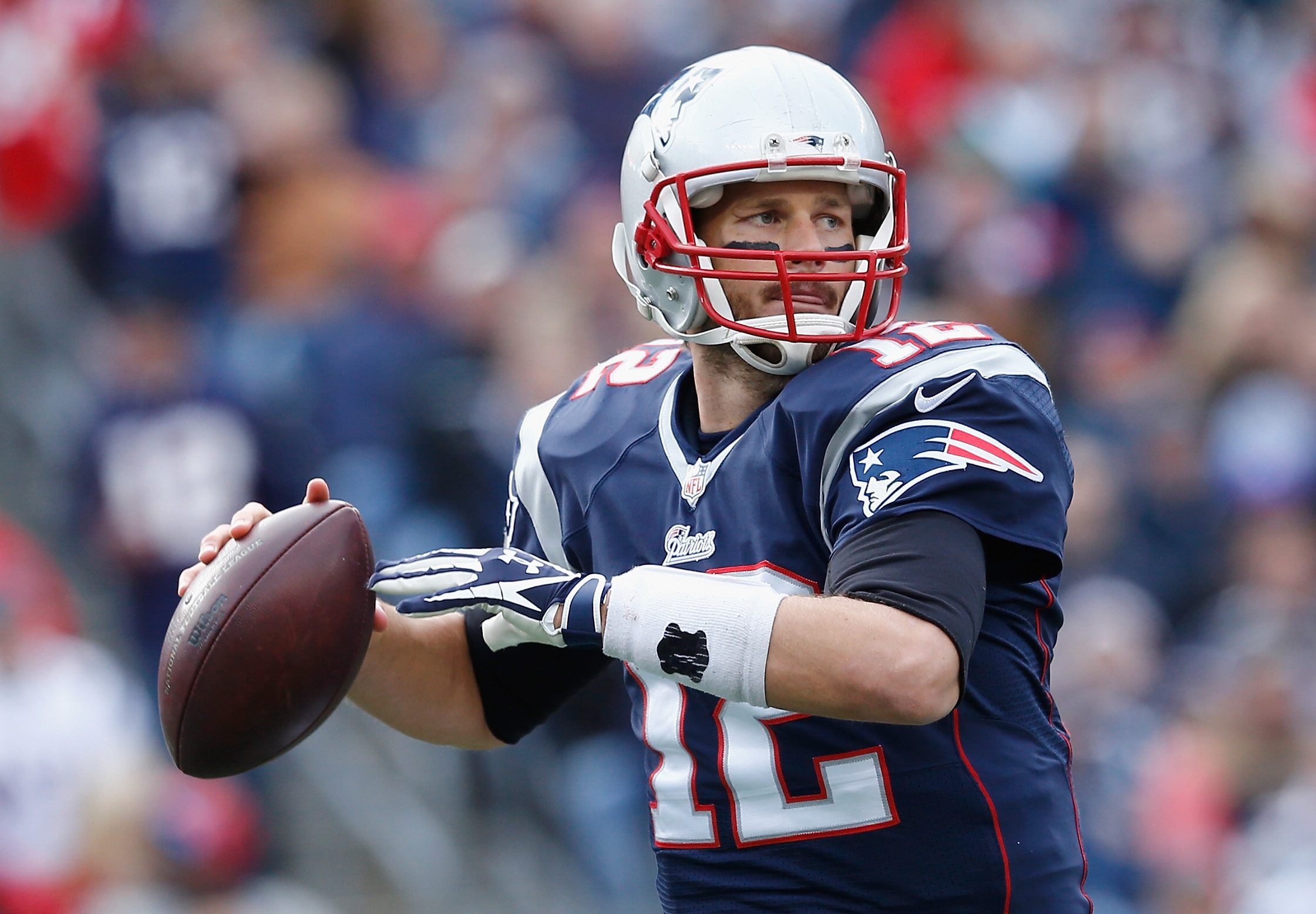 Tom Brady #12 of the New England Patriots passes the ball during the second quarter against the Chicago Bears at Gillette Stadium on October 26, 2014 in Foxboro, Massachusetts. (Jim Rogash&mdash;Getty Images)