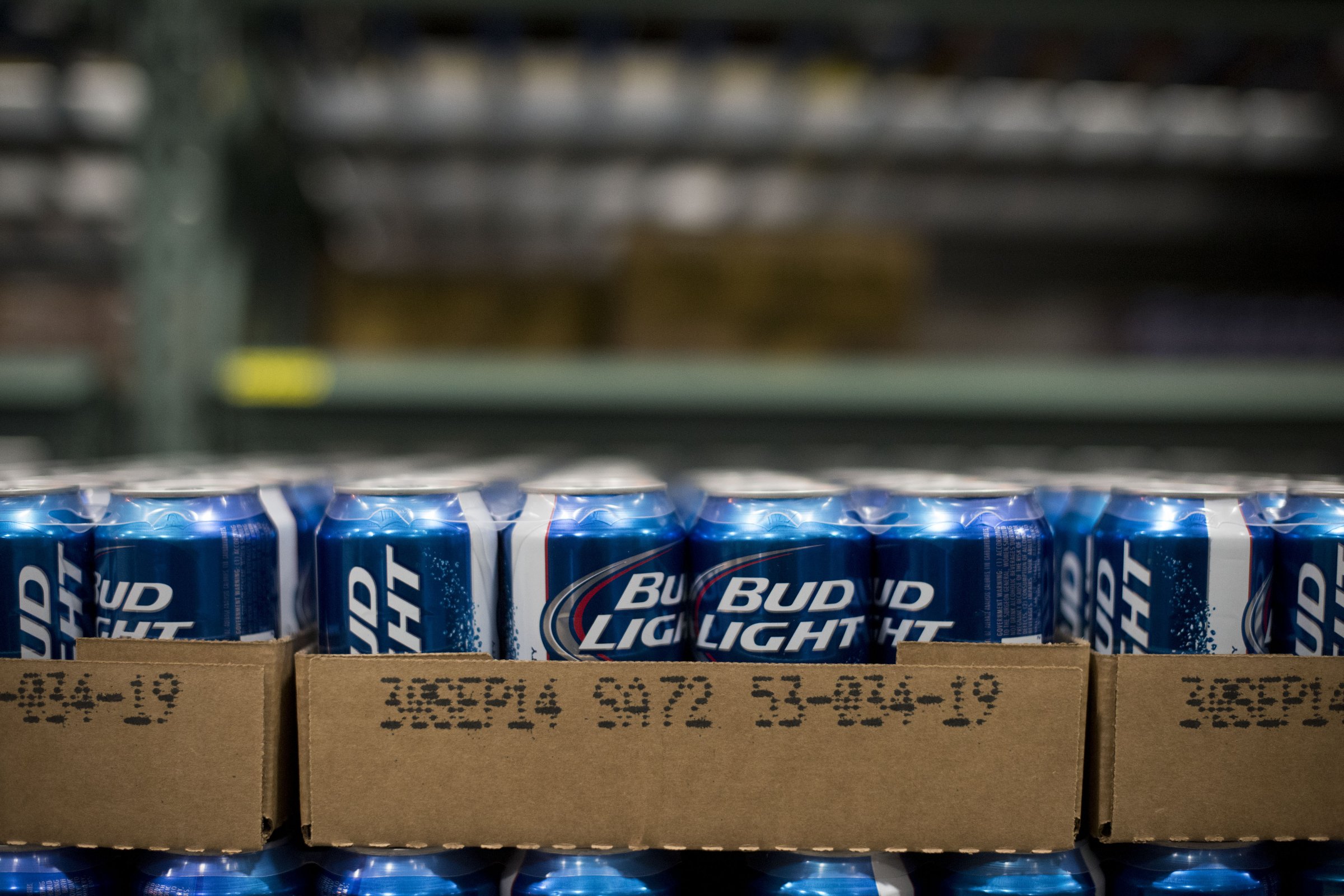 Cans of Anheuser-Busch Bud Light brand beer sits in a warehouse in Peoria, Ill.
