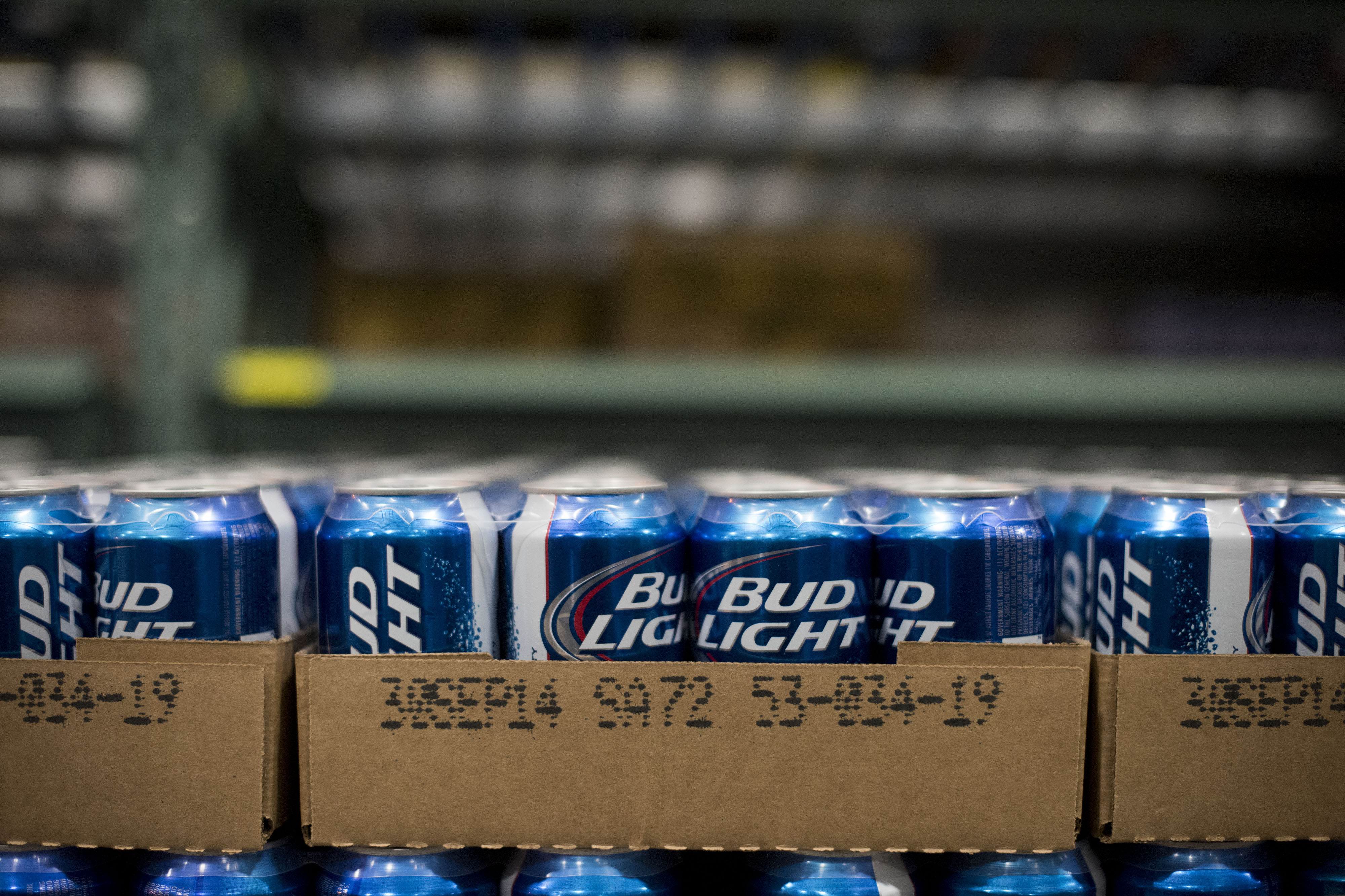 Cans of Anheuser-Busch Bud Light brand beer sits in a warehouse in Peoria, Ill. (Bloomberg—Getty Images)