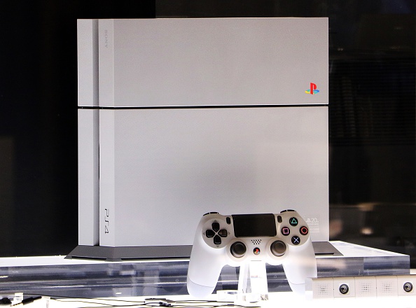 The PlayStation 4 20th anniversary edition is displayed at Sony's showroom in Tokyo on Dec. 4, 2014 (Yoshikazu Tsuno—AFP/Getty Images)
