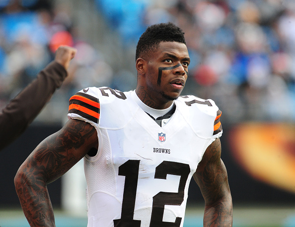 Josh Gordon of the Cleveland Browns watches the action against the Carolina Panthers at Bank of America Stadium in Charlotte, N.C., on Dec. 21, 2014 (Scott Cunningham—Getty Images)