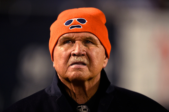 Former head coach and tight end Mike Ditka of the Chicago Bears stands on the field during a game against the New Orleans Saints at Soldier Field in Chicago on Dec. 15, 2014 (Brian D. Kersey—Getty Images)
