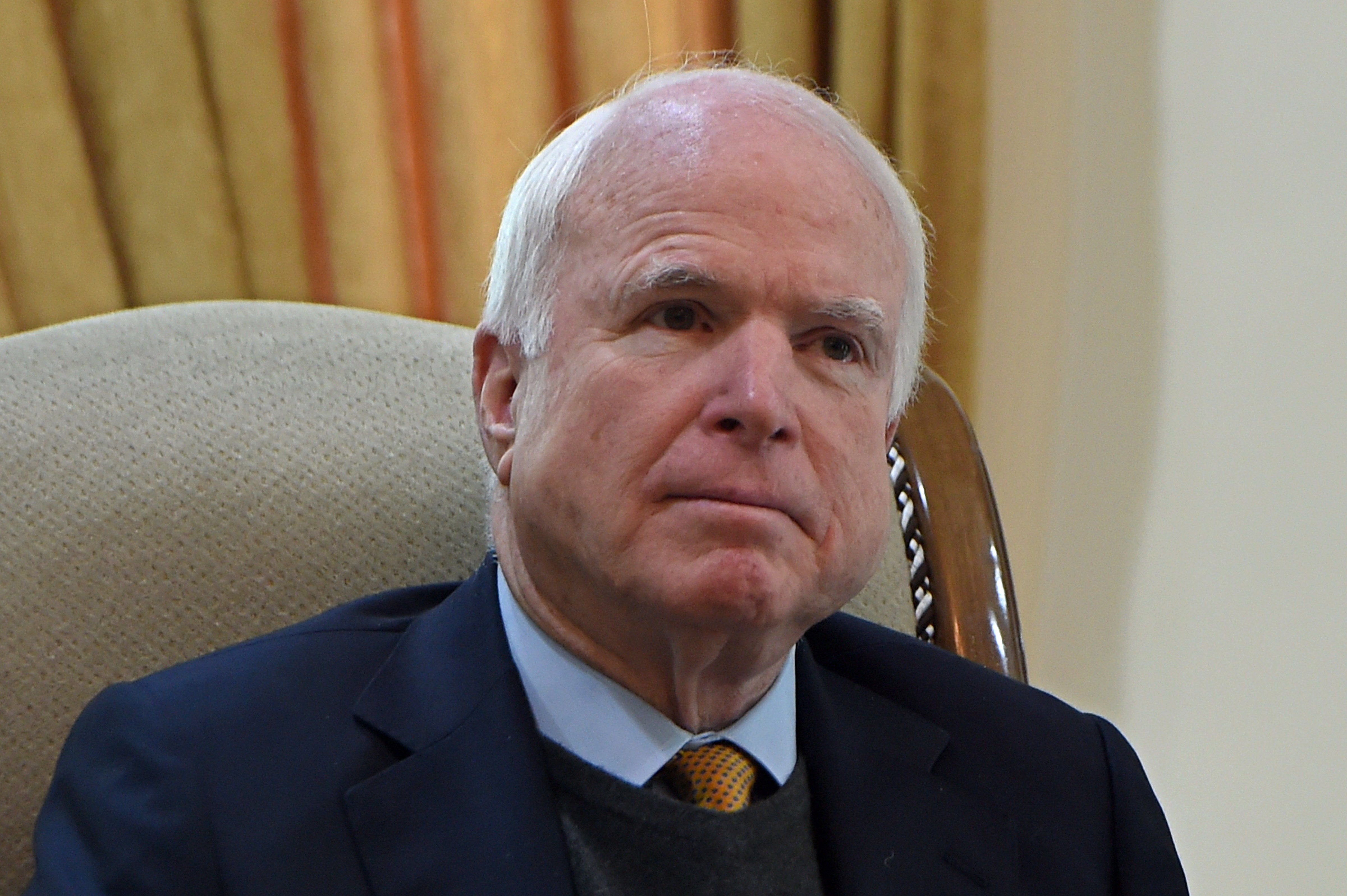 U.S. Senator John McCain looks on during a meeting with Afghan Chief Executive Officer Abdullah Abdullah in Kabul on Dec. 25, 2014 (Wakil Kohsar—AFP/Getty Images)