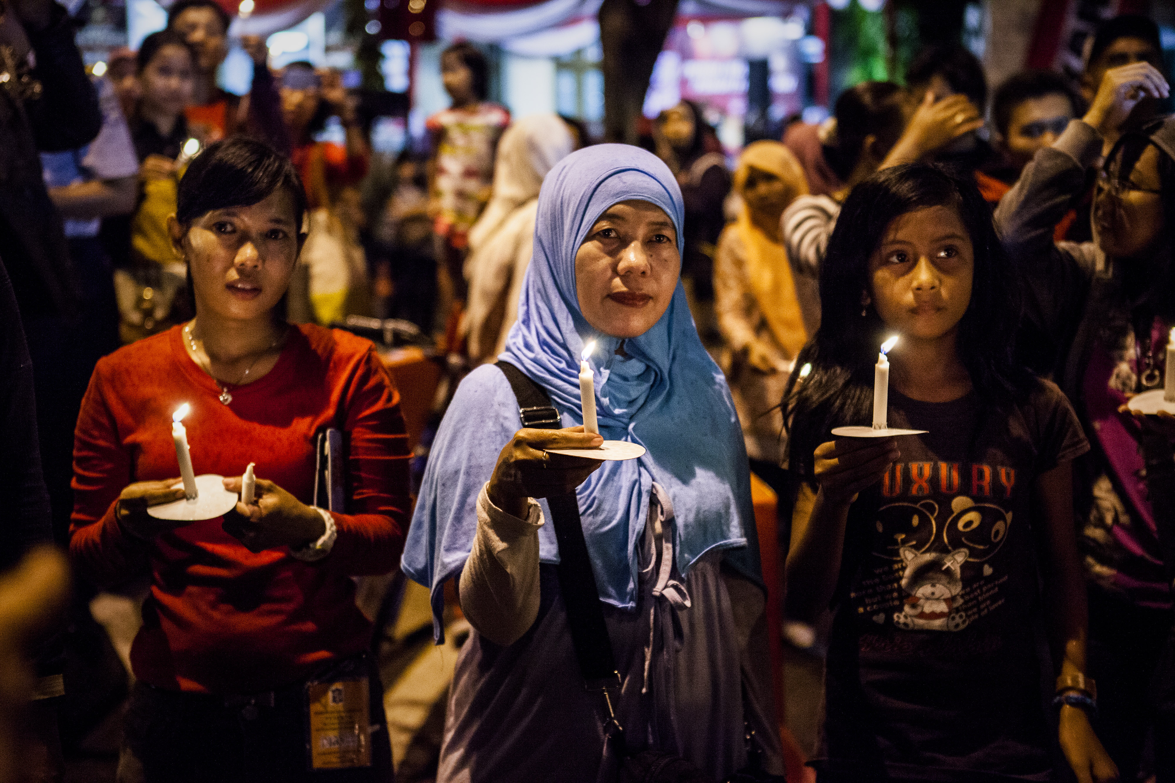 Residents pray for victims of AirAsia Flight QZ 8501 crash on Dec. 31, 2014, in Surabaya, Indonesia